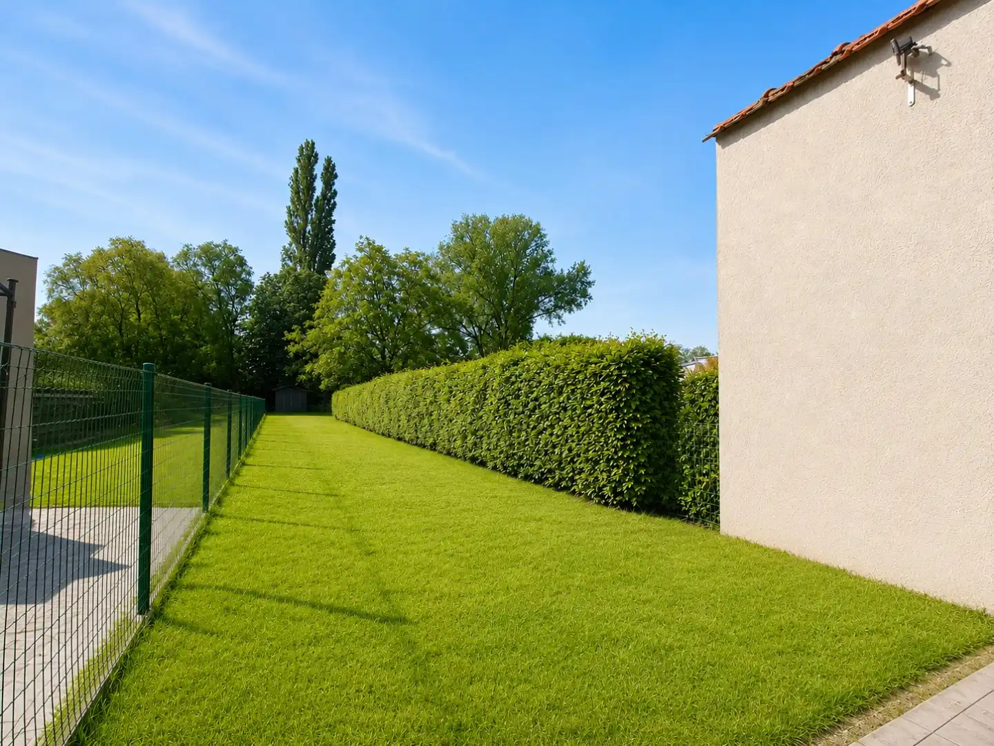 Rijwoning met tuin foto 8