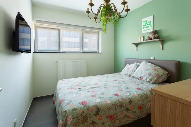 Gelijkvloers 2 slp. appartement met tuin en garage in hartje Brasschaat! foto 14