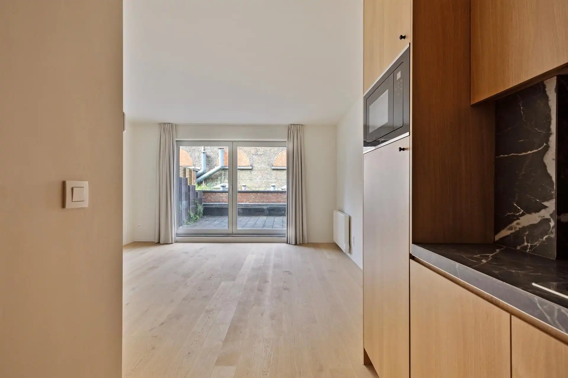Volledig gerenoveerd 1-slaapkamer appartement foto {{pictureIndex}}