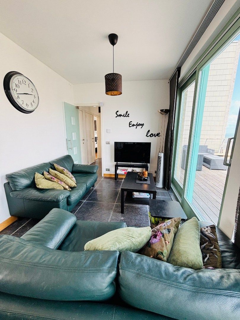 RIANTE PENTHOUSE MET PANORAMISCH ZICHT OP DE ZEELIJN foto 8