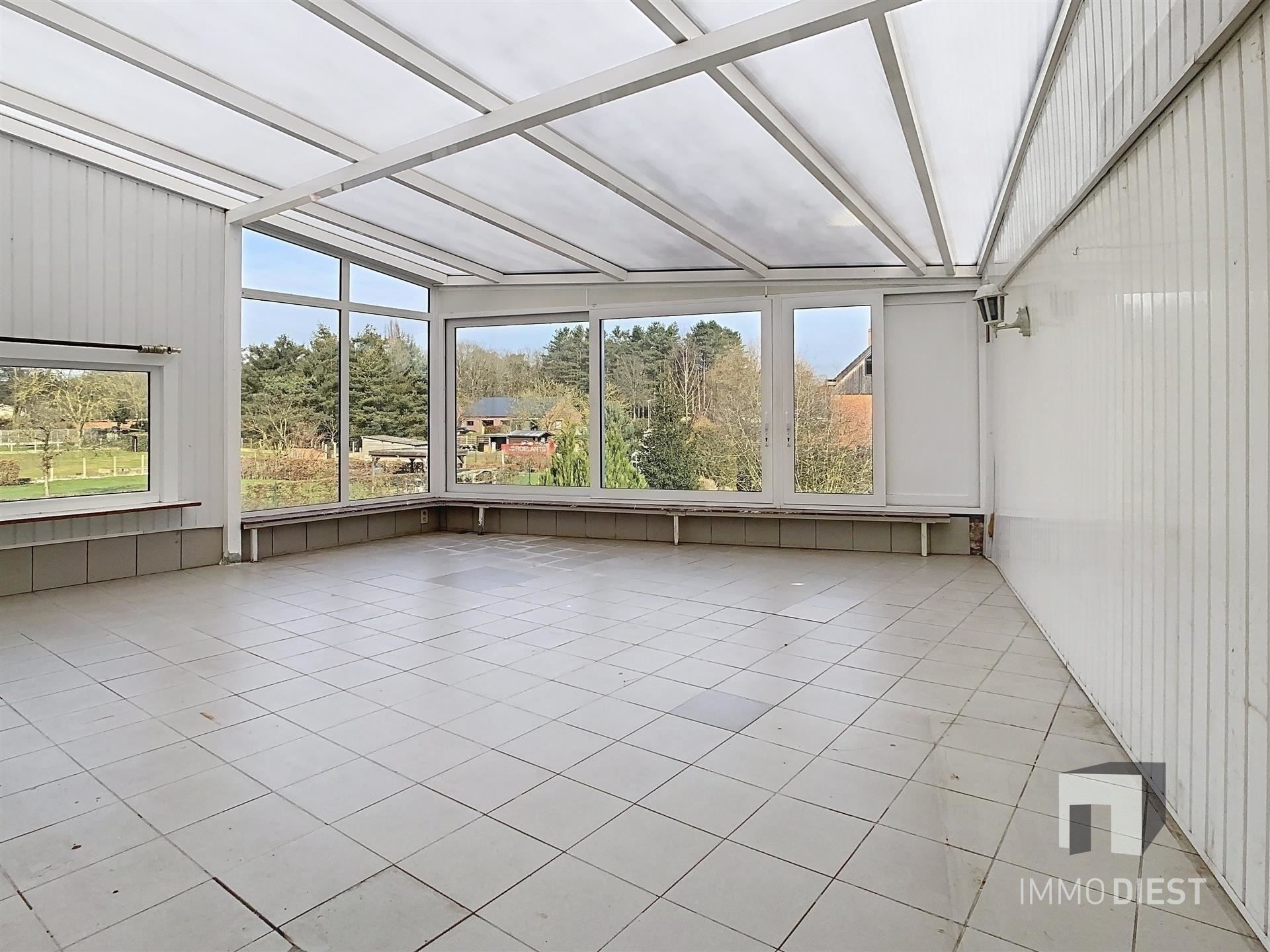 Commercieel handelshuis met appartement, veelzijdige opportuniteit in Okselaar! foto 12