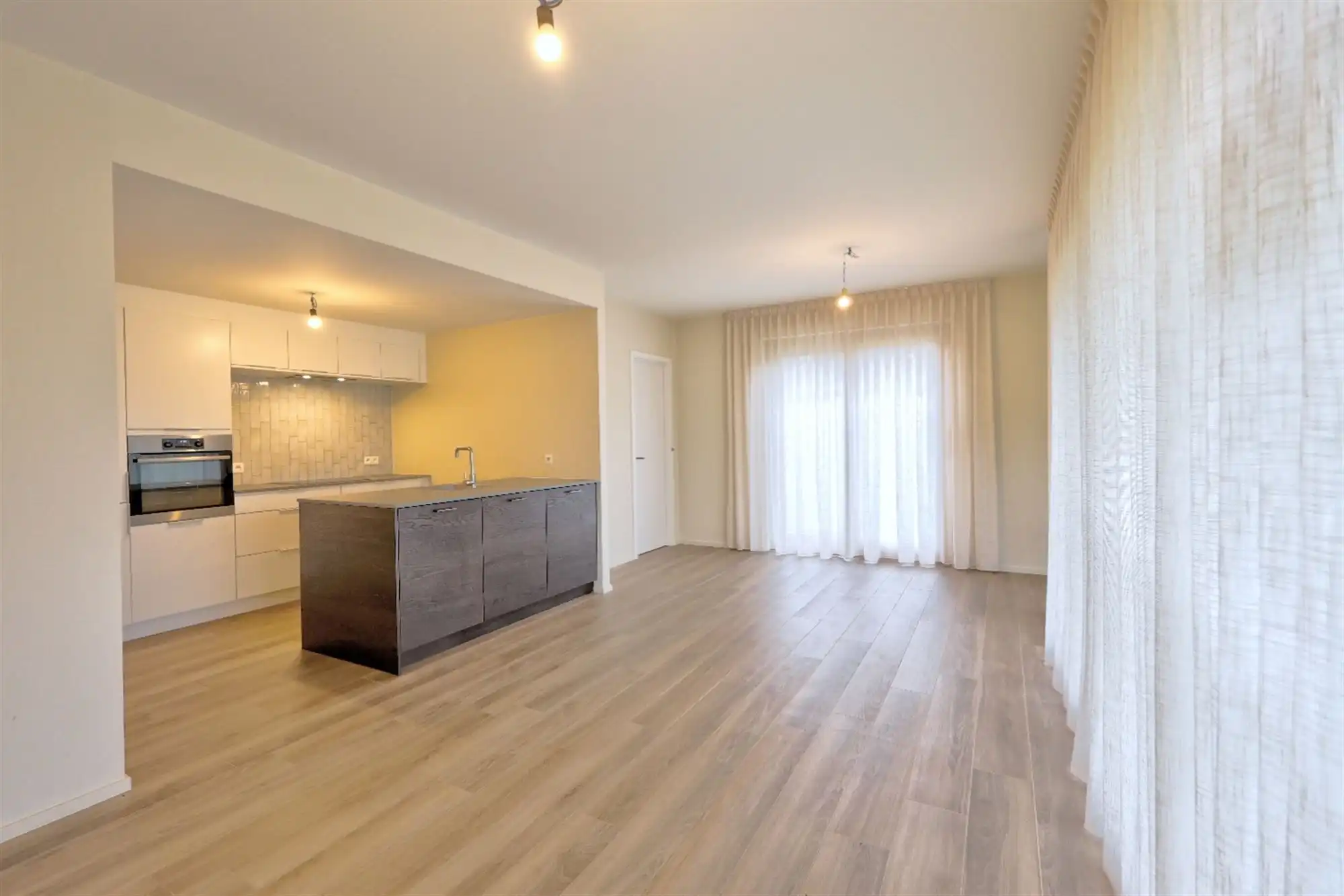 Recent gelijkvloers appartement met 2 slaapkamers en tuintje  foto 2