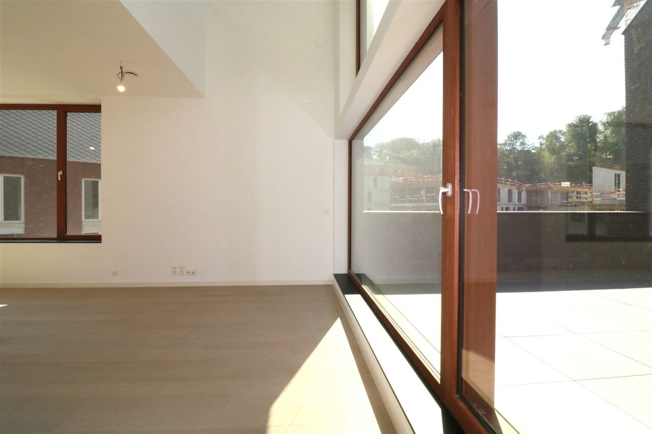 Bijzonder opgevat penthouse, 2 slpk., garage, groot terras foto 6