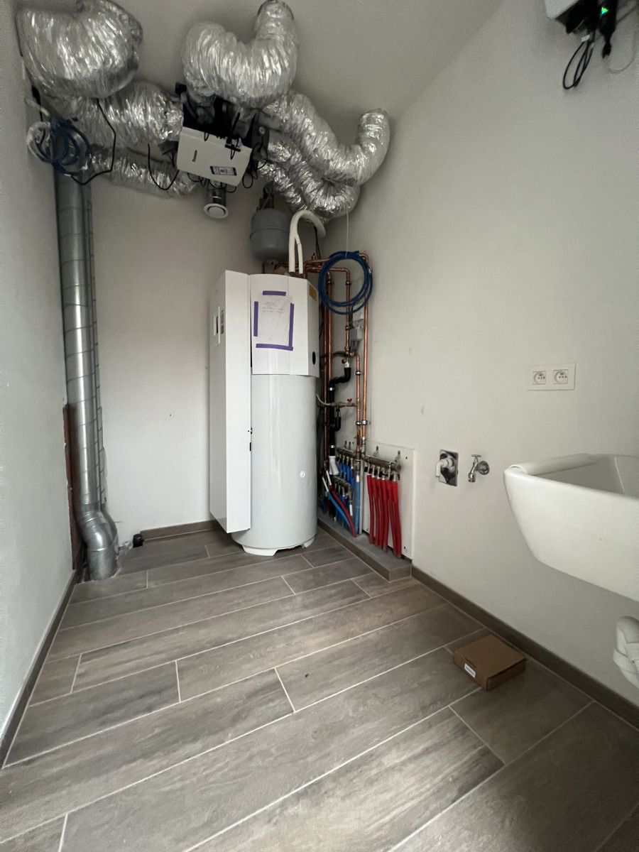 Te huur - Nieuwbouwwoning met  zonnige tuin en carport foto 11
