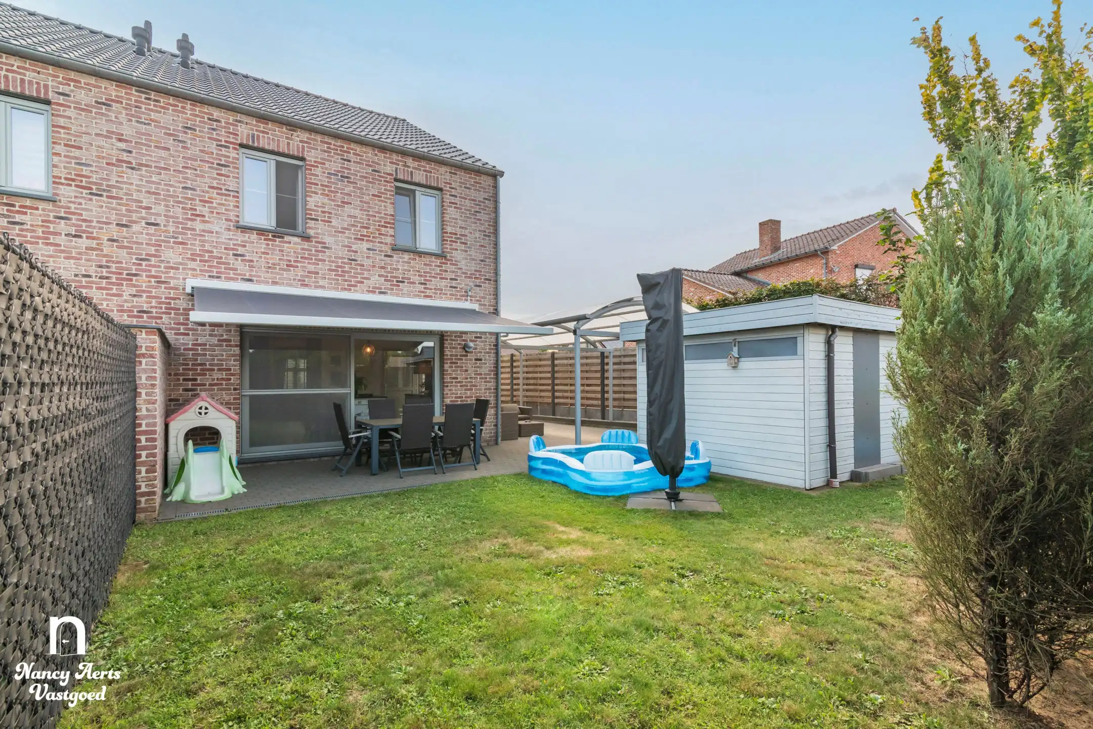 Gezinswoning met tuin en carport in rustige straat in Paal foto 3
