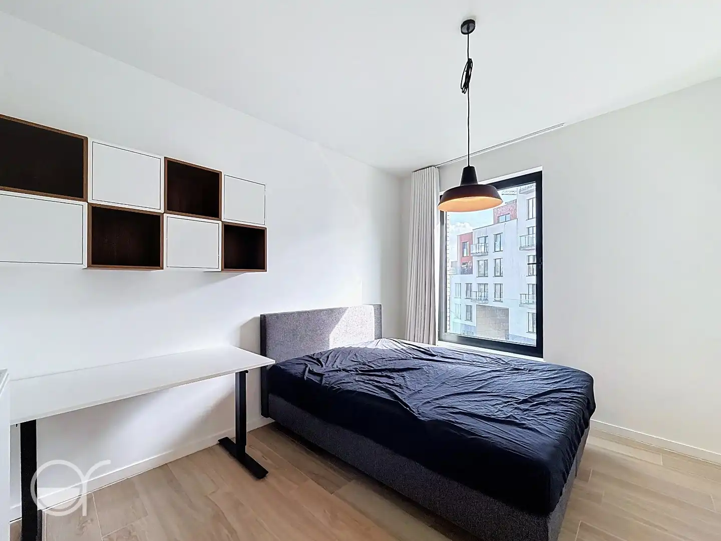 Ruim en lichtrijk tweeslaapkamerappartement met autostaanplaats te huur foto 7