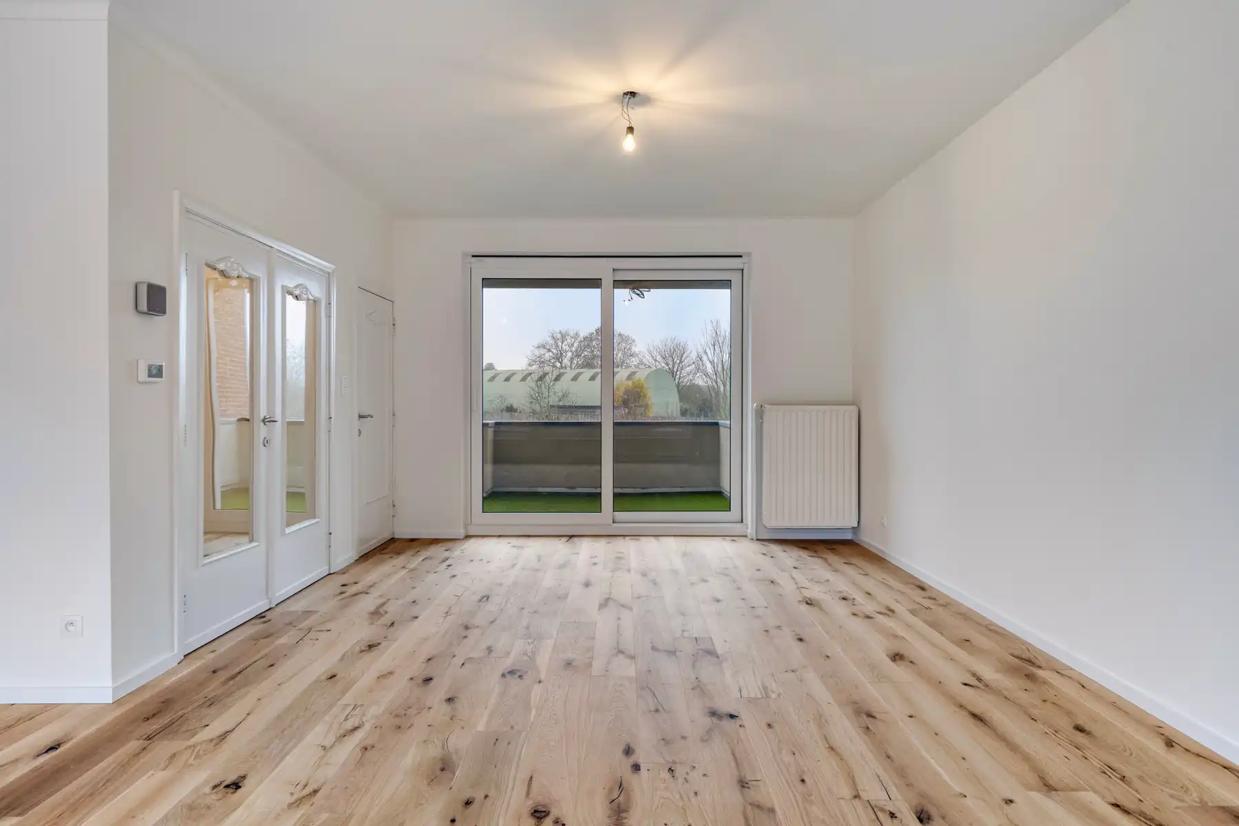 Instapklare woning met 3 slpk, garage en tuin! foto 6