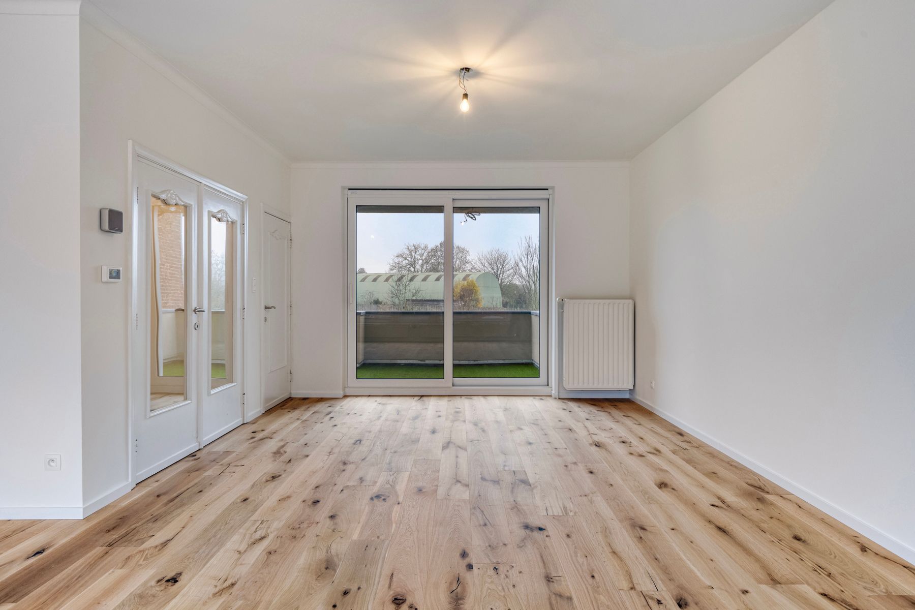 Instapklare woning met 3 slpk, garage en tuin! foto 6