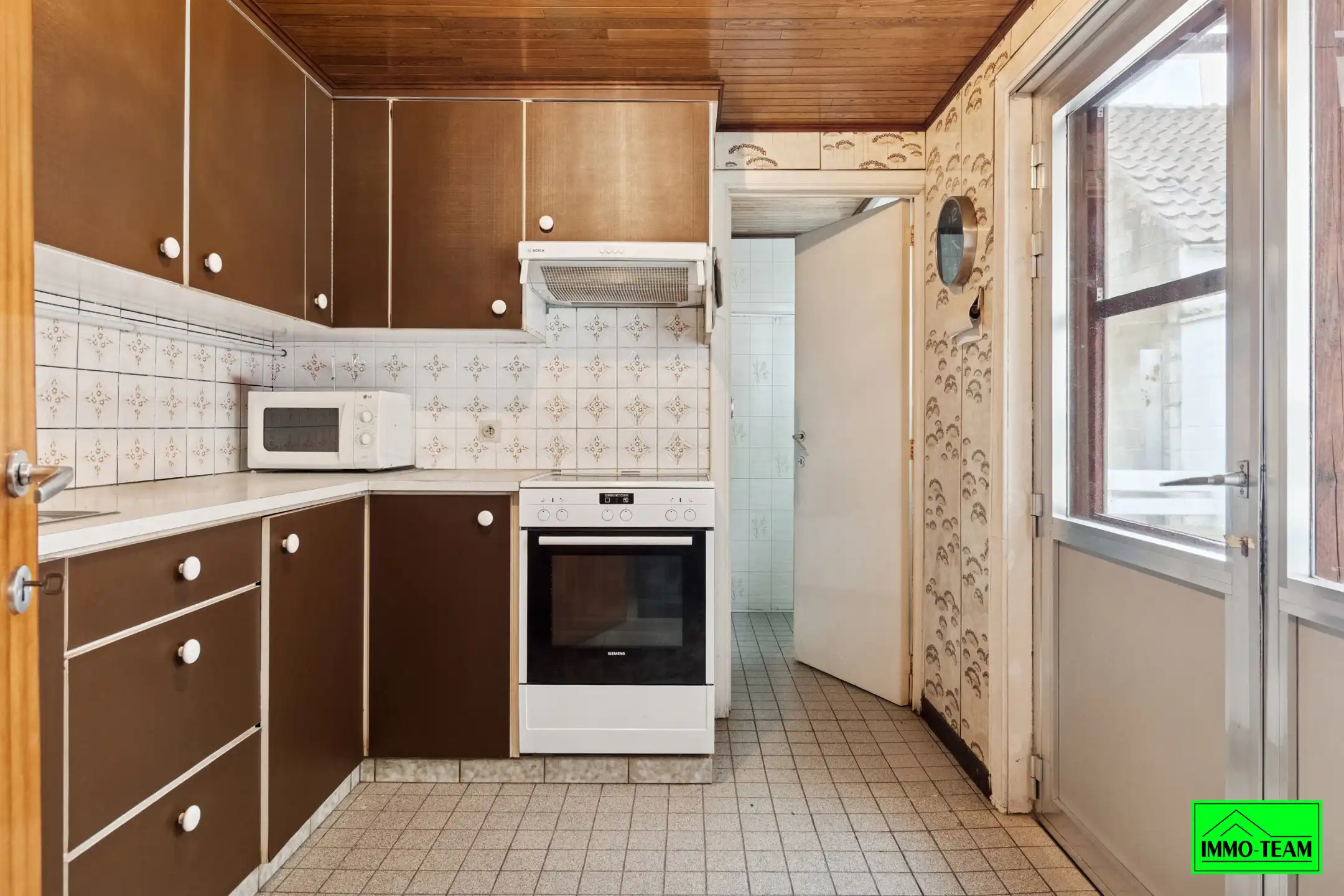 Te renoveren 2-gevelwoning met tuin  foto 6