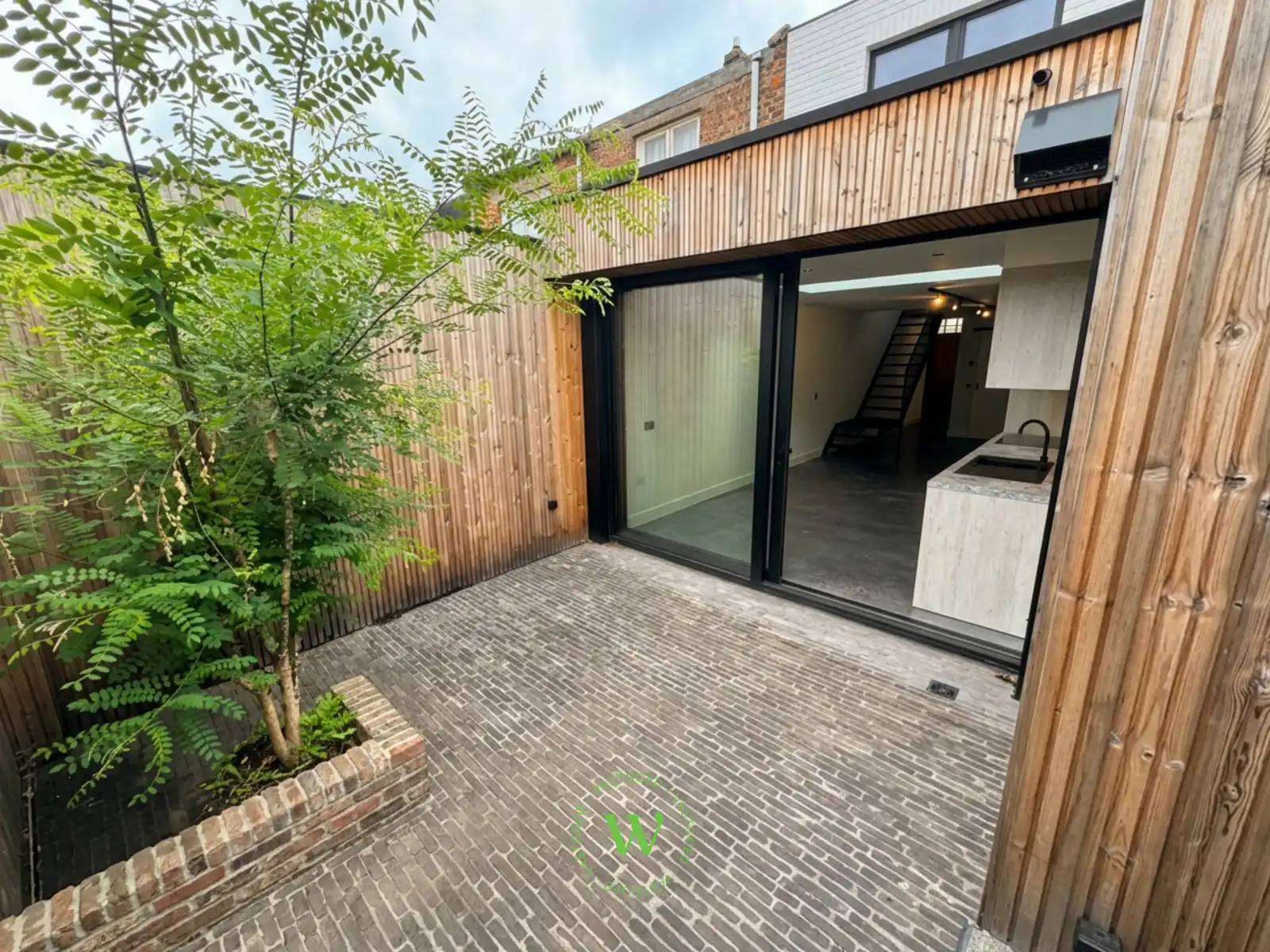 Volledig gerenoveerde woning met zonnige buitenruimte. foto 4