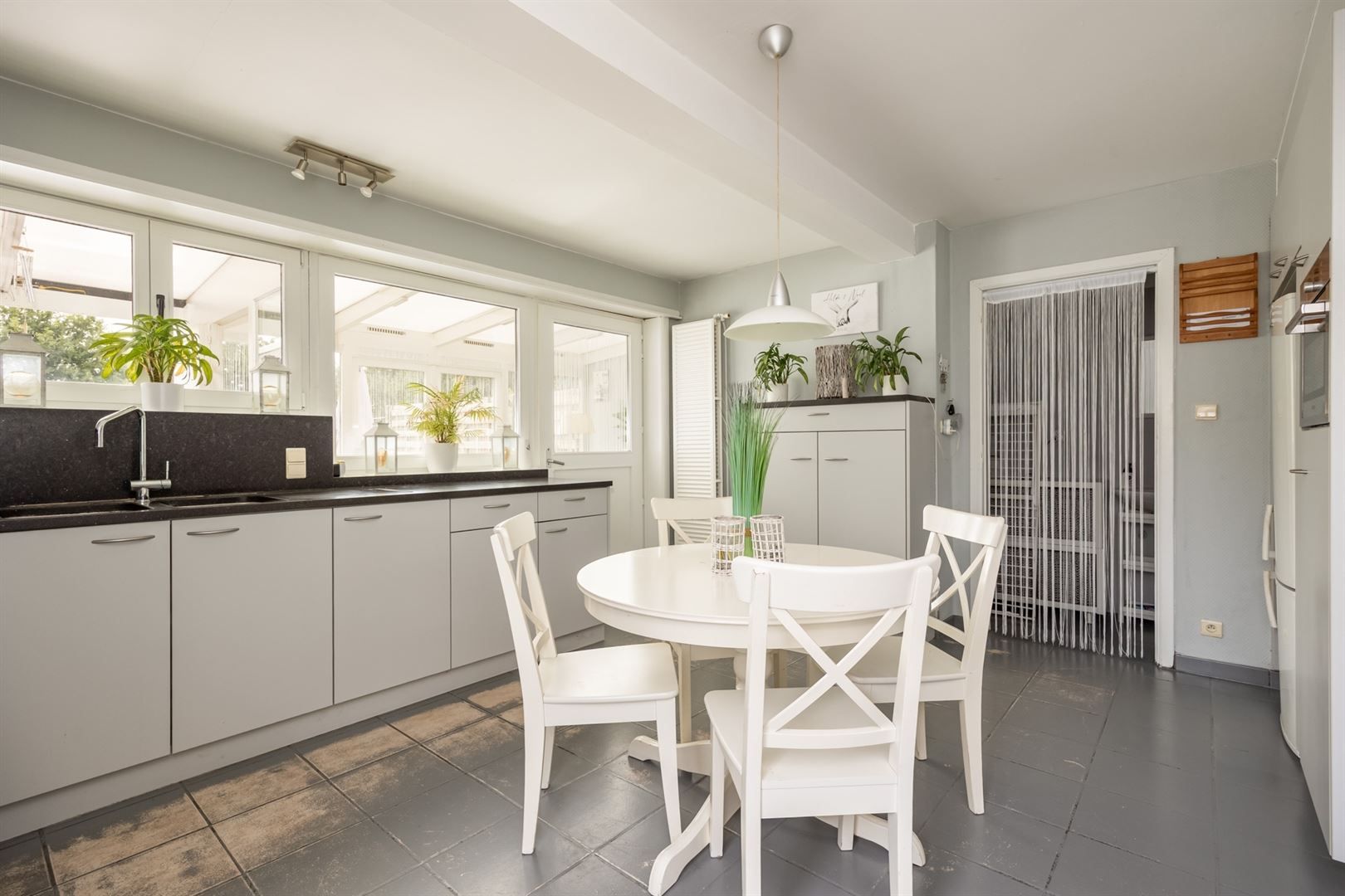 Instapklare halfopen woning met zonnige tuin aan de Vaart Schoten foto 7