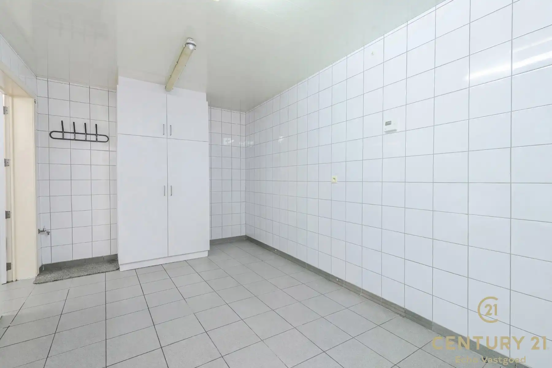 Handelszaak met gerenoveerde woonst op topligging  foto 6