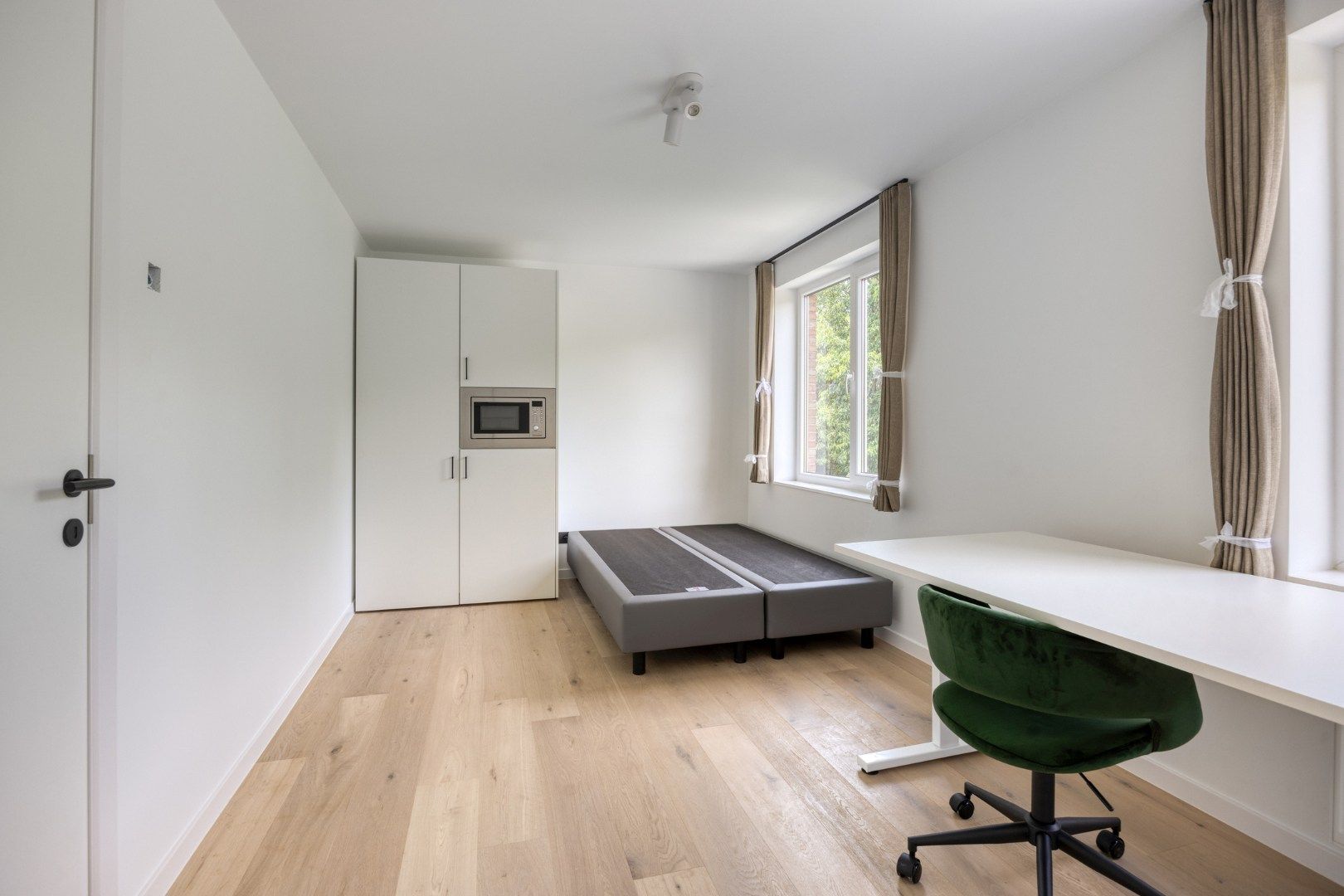 Volledig gerenoveerde studentenkamer in residentie met 29 studentenkamers met eigen sanitair en terras in hartje Leuven - EPC label A! foto 10