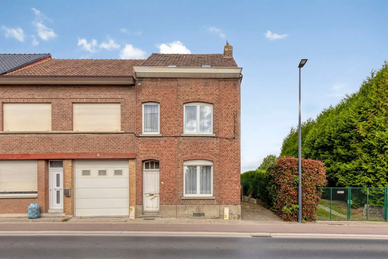 Te renoveren 3-gevelwoning met mogelijks 4 slaapkamers + garage foto 25