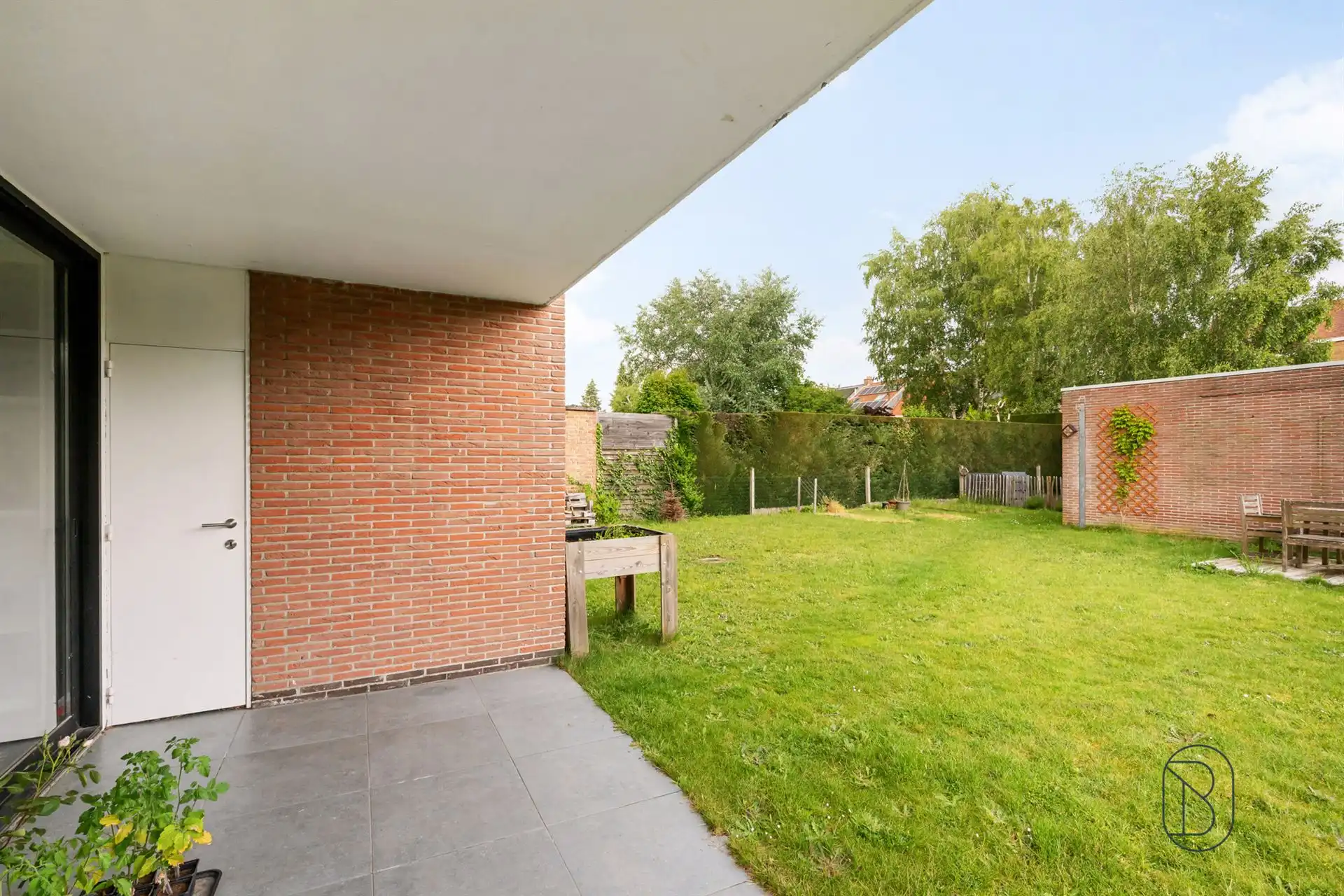 Topgelegen gelijkvloers appartement met 2 slk, tuin + aparte garagebox foto 7