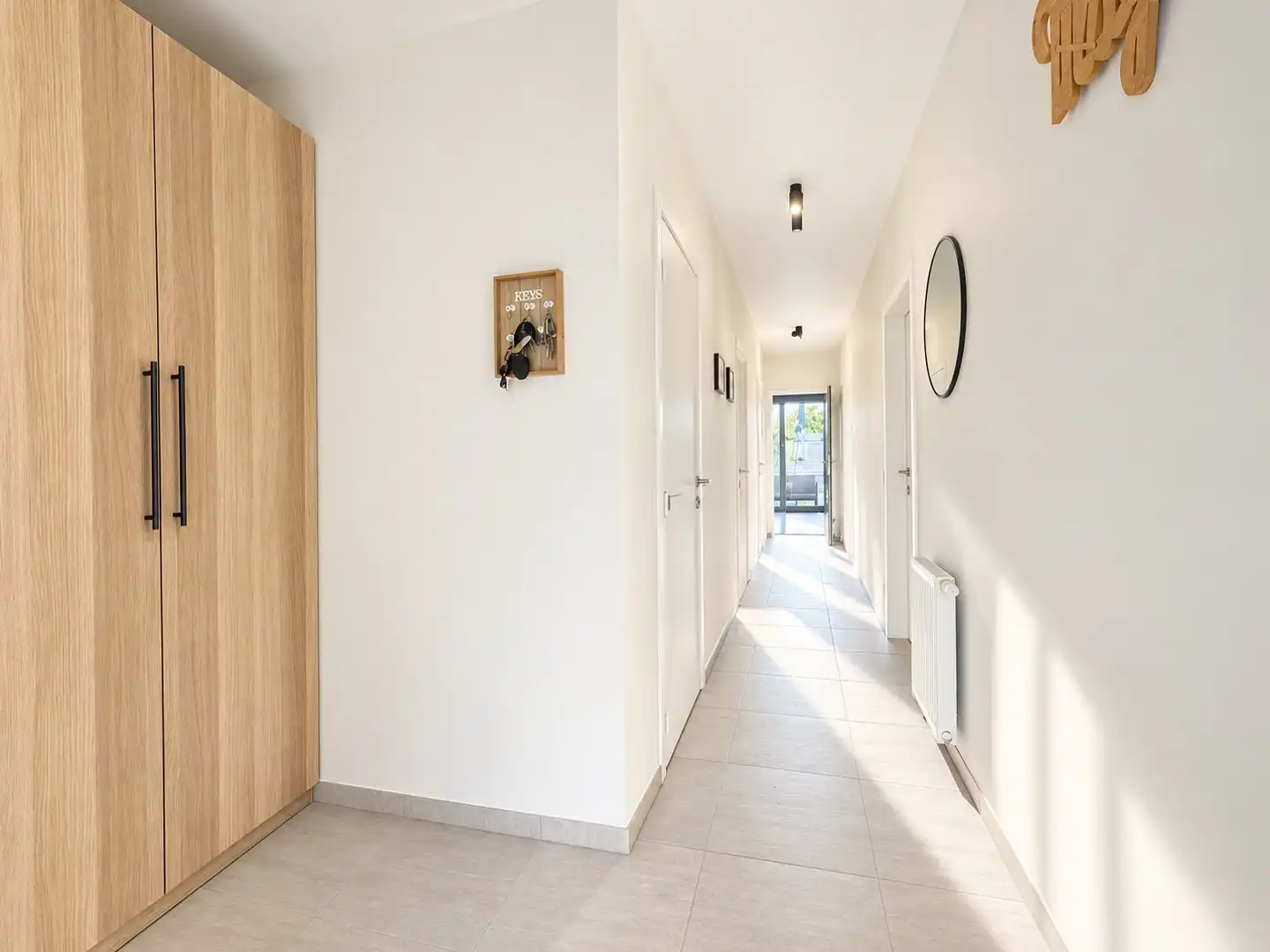 Ruim gelijkvloers appartement (127 m²) met gróót terras, garage én staanplaats foto 3