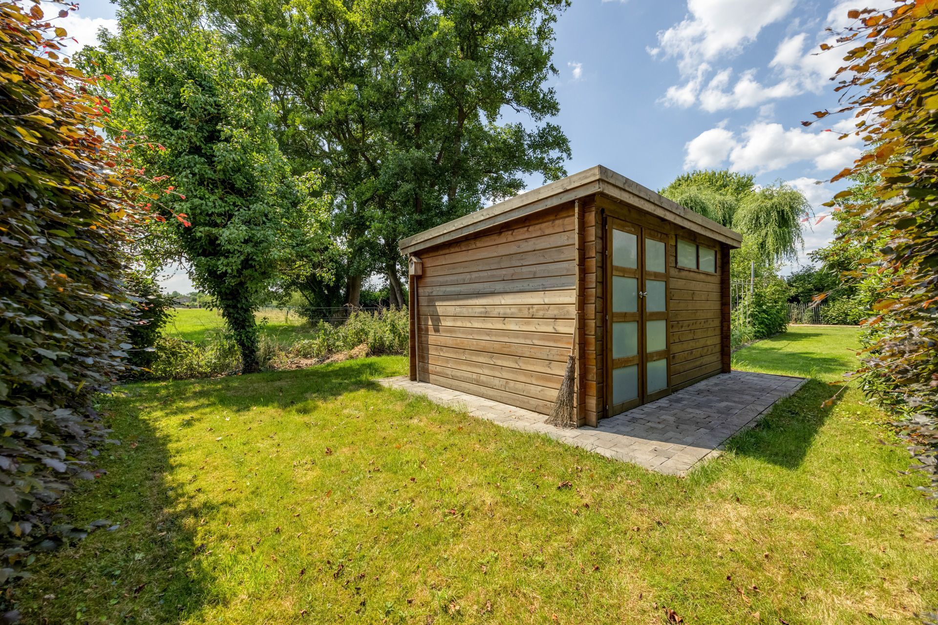 Open bebouwing met 4 slpks en grote tuin foto 26