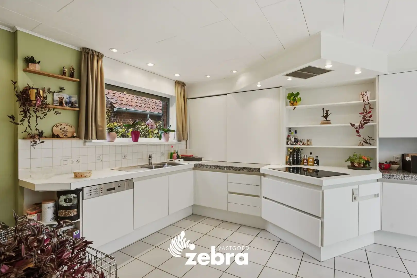 Ruime, energiezuinige woning met grote tuin, zwemvijver en schuur in Beveren aan de IJzer! foto 6