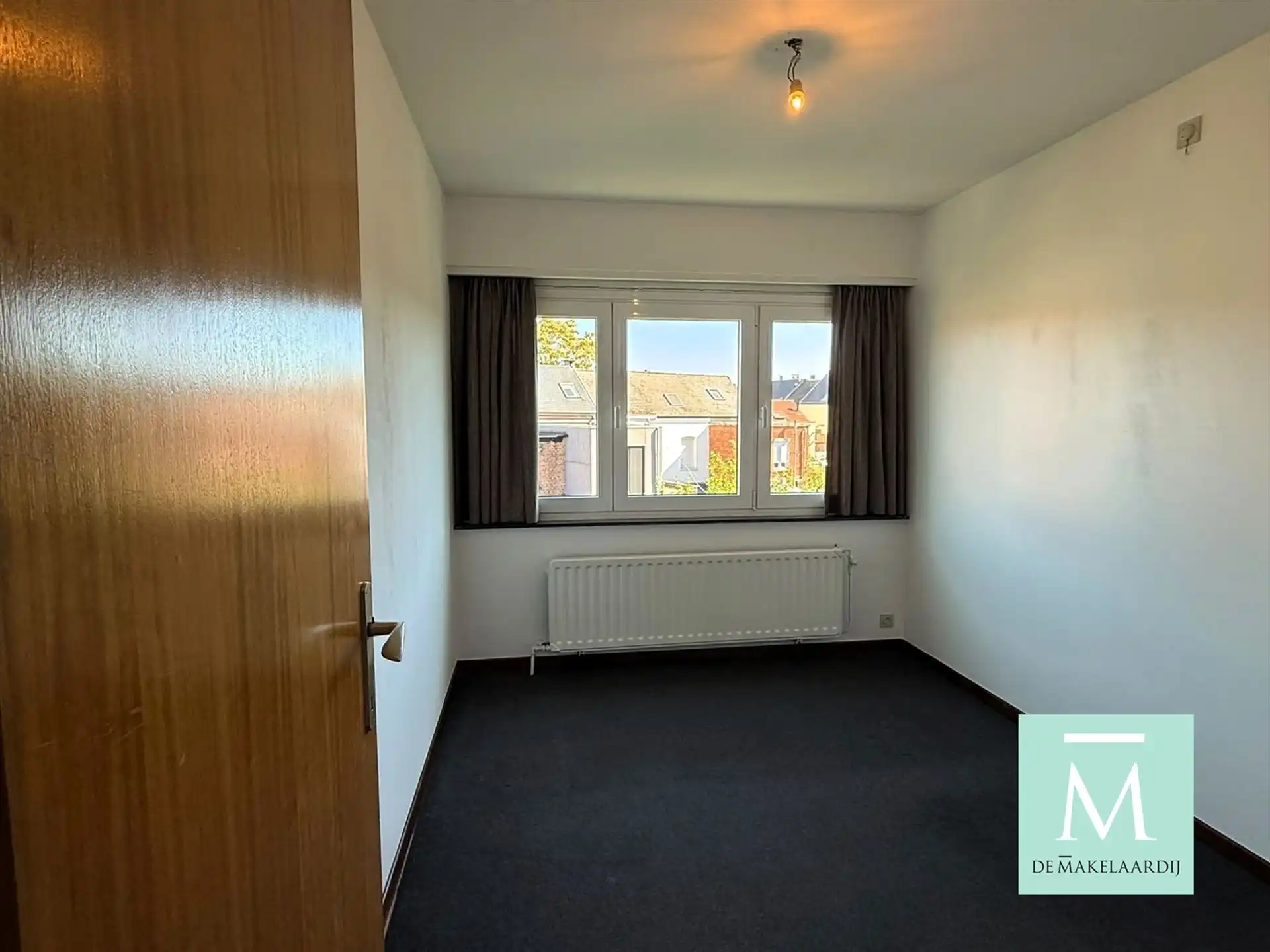 Ruim duplexappartement met 3 slaapkamers nabij het Vrijbroekpark. foto 9