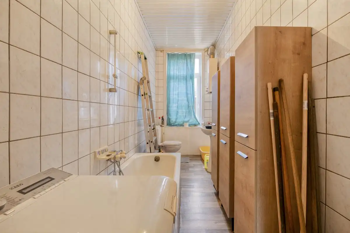 Opbrengsteigendom met renovatiepotentieel in Anderlecht foto 38