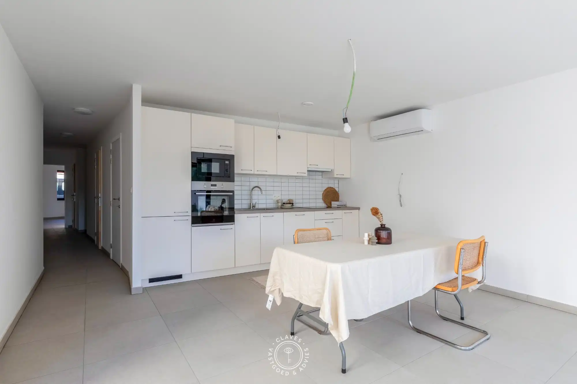 Ingrijpende energetische renovatie: gelijkvloers appartement met een zonnig terras aan 2% foto 2