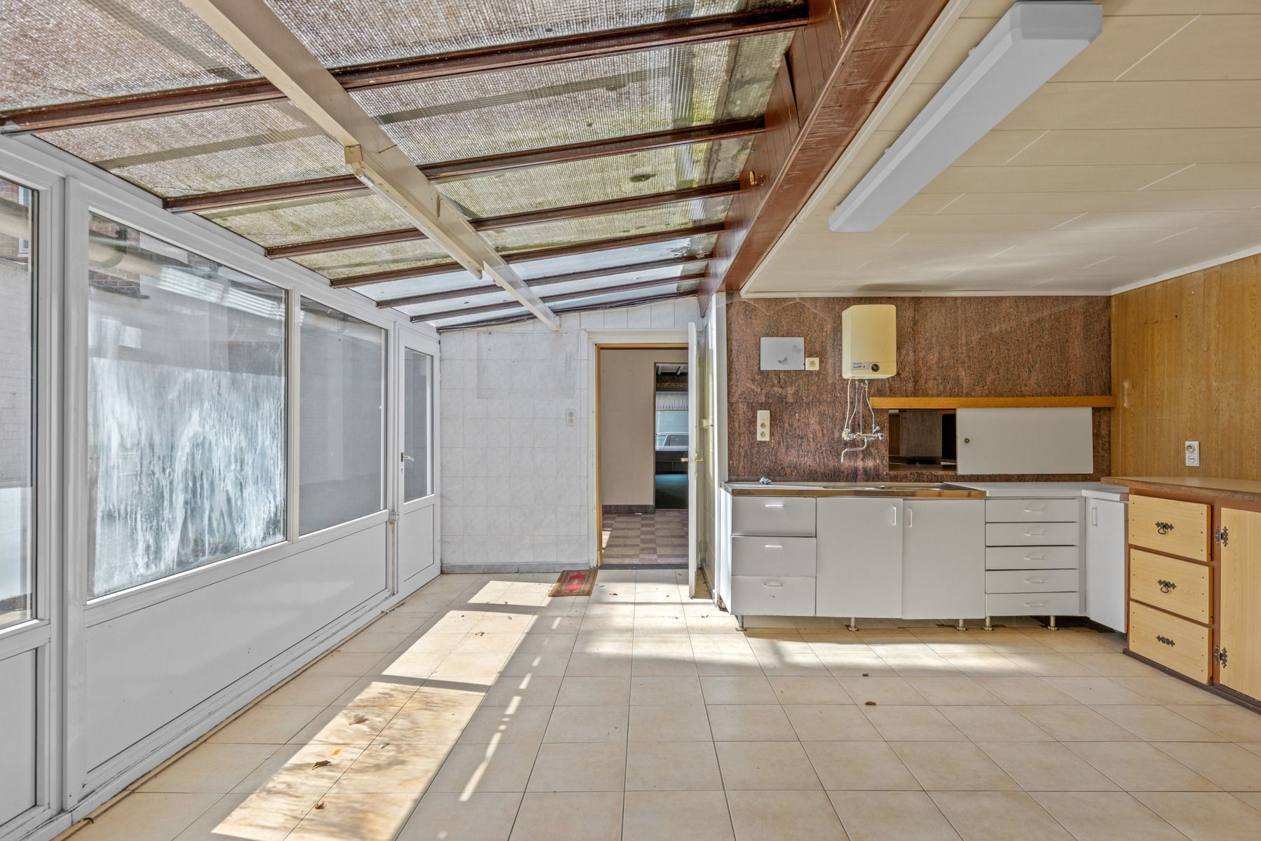 Te renoveren woning met magazijn centrum Heusden foto 9
