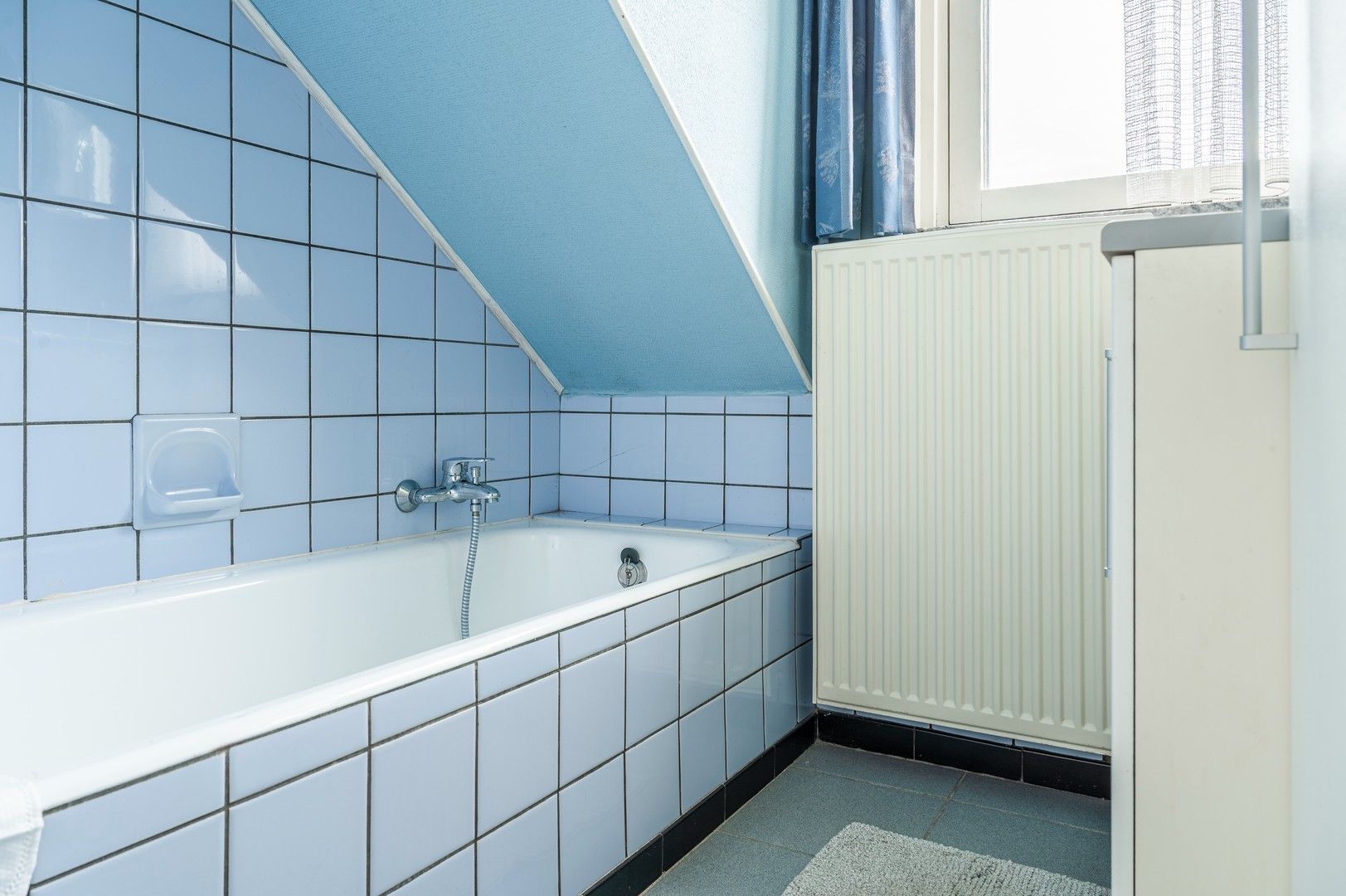 Praktische bel-etagewoning met 3 slaapkamers en tuin. foto 10