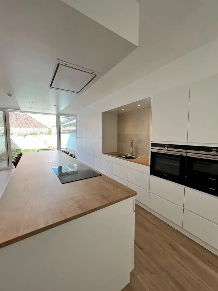 Gerenoveerd duplex appartement met tuin in centrum Leuven te huur foto 11