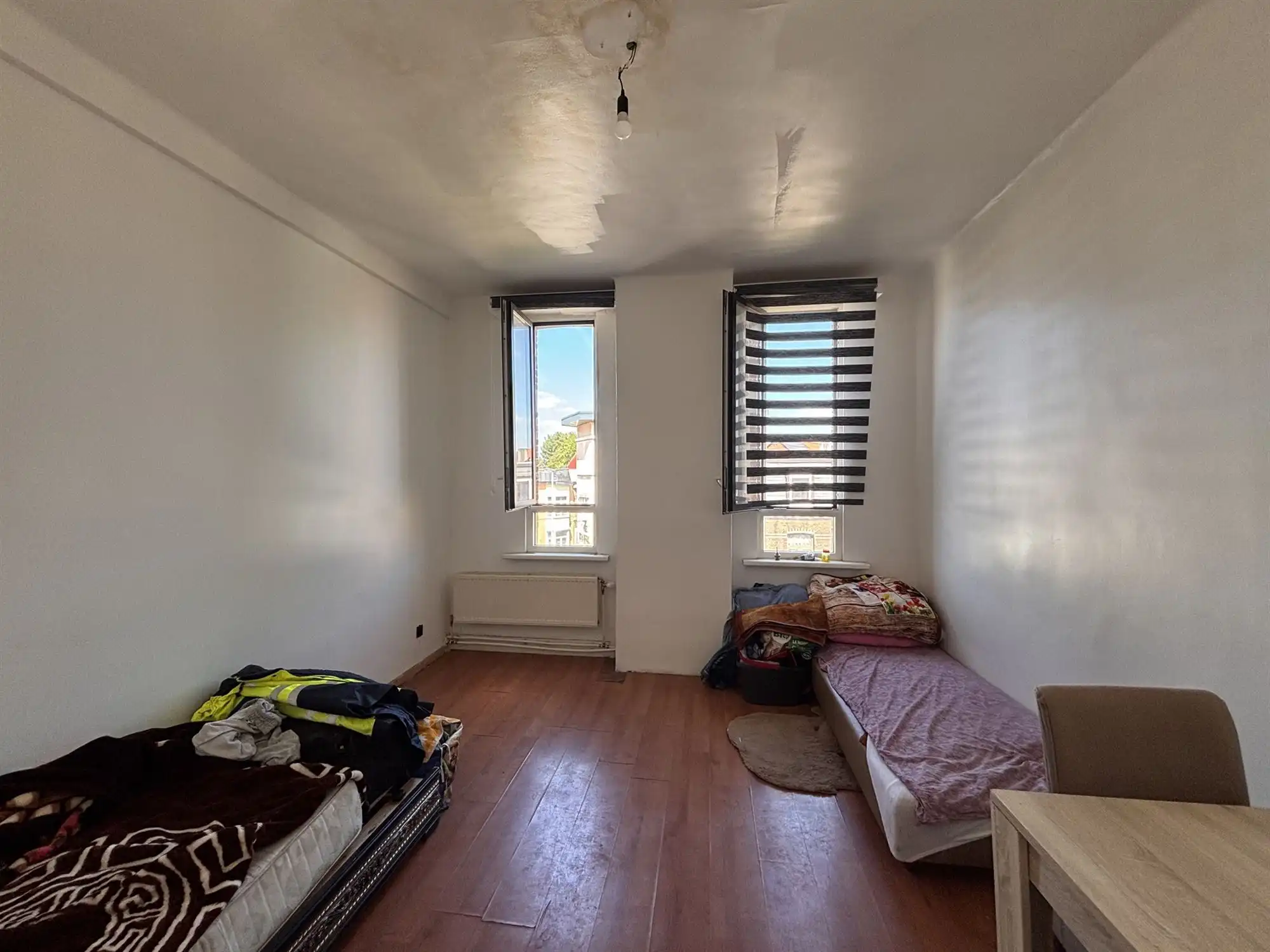 Opbrengsteigendom handelszaak + 3 appartementen foto 17