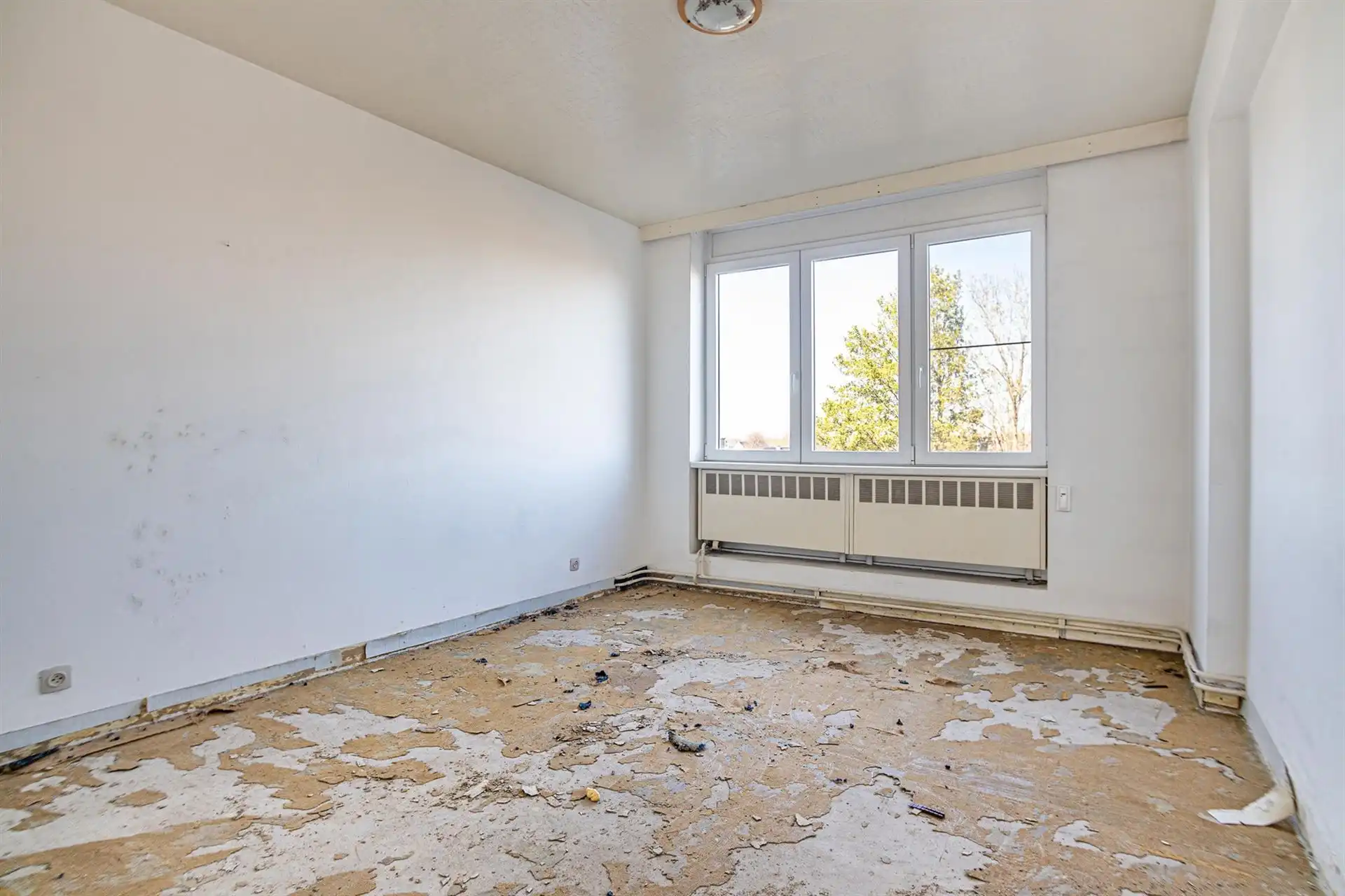 Ruim 3-slpk app met potentieel, berging + garage incl. foto 12