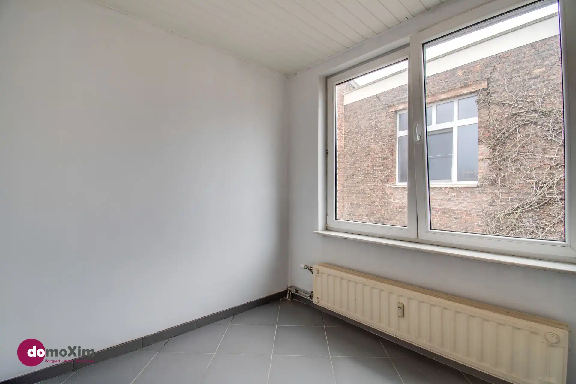 Opbrengsteigendom met 3 appartementen en garage nabij het station van Mechelen foto 11