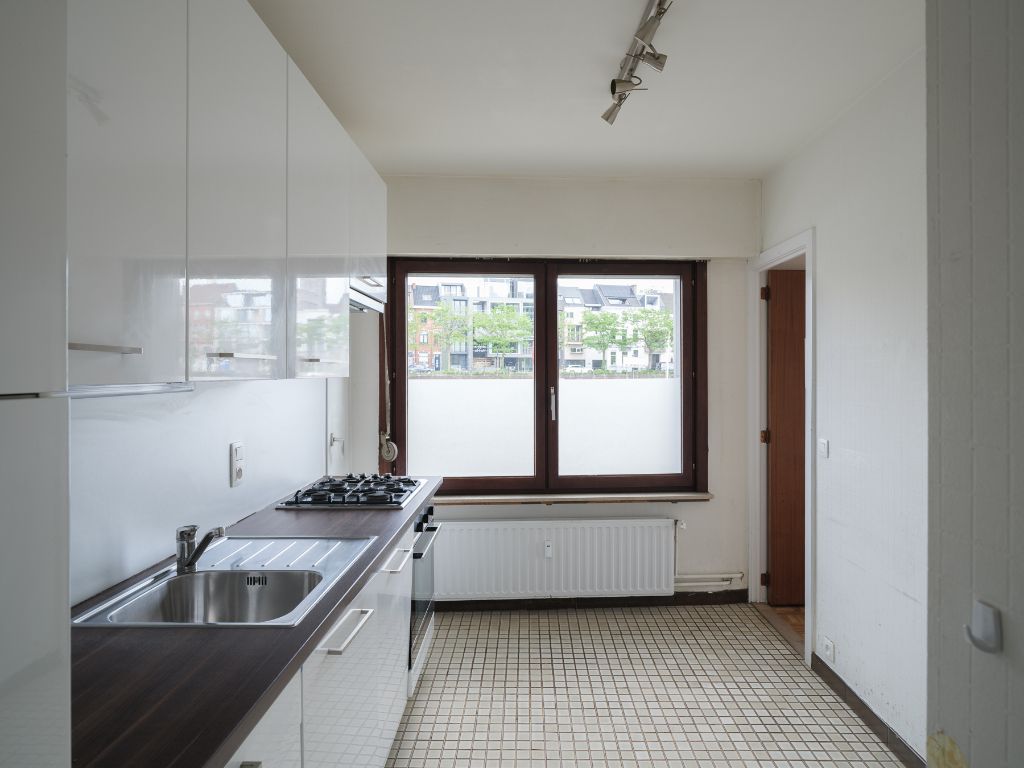 Op te frissen appartement met buitenruimte en uitzonderlijk potentieel foto 5