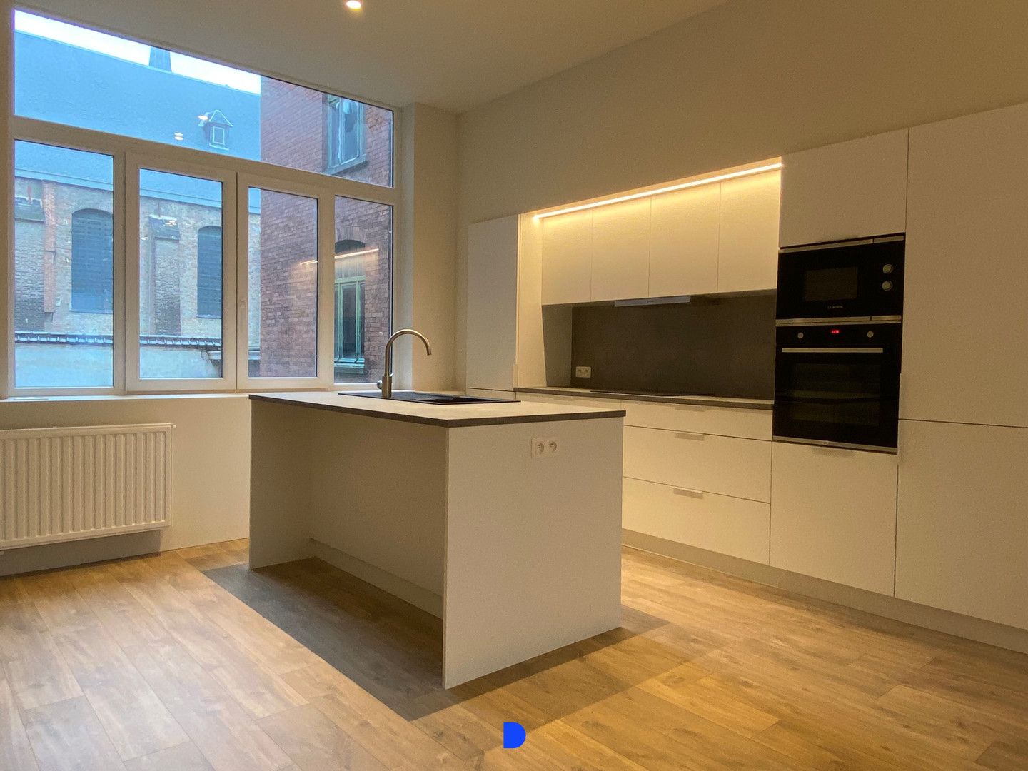 Ruim appartement in het centrum van Kortrijk! foto 4