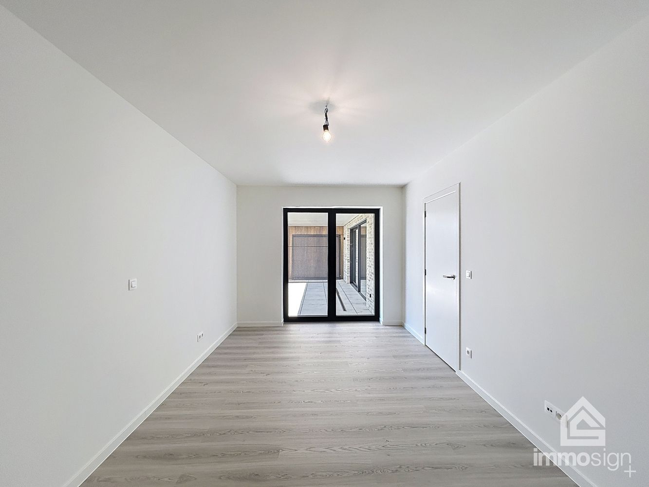 Instapklaar nieuwbouwappartement met 2 slaapkamers, terras en autostaanplaats te Kinrooi foto 11
