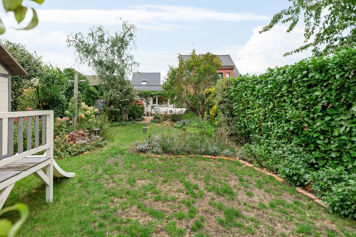 Super charmante, halfopen starterswoning met 2 slpk. en toffe tuin foto 23