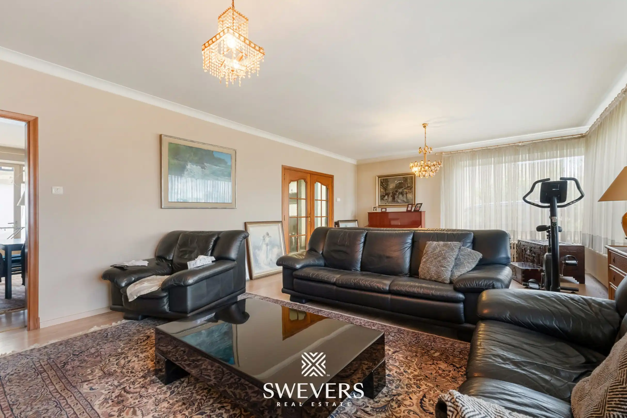 Ruime halfopen bebouwing met 4 slaapkamers en veel renovatiepotentieel op topligging in Hasselt foto 5