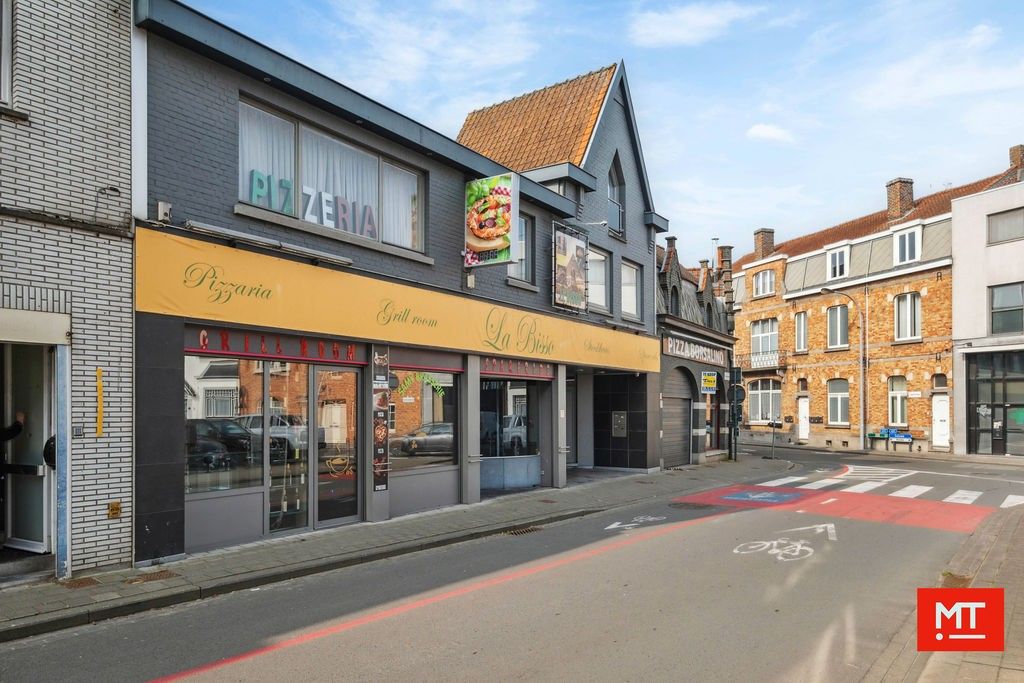 Veelzijdig gebouw bestaande uit handelsruimte, woning en appartement in het centrum van Wervik foto 29