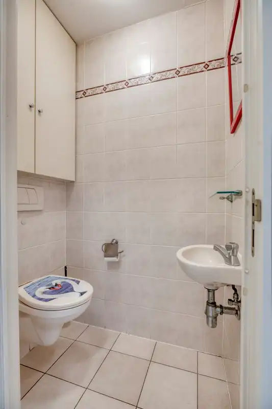 Ruim 2 slaapkamer appartement in het hartje van Koksijde met aankoopmogelijkheid van een garage foto 11