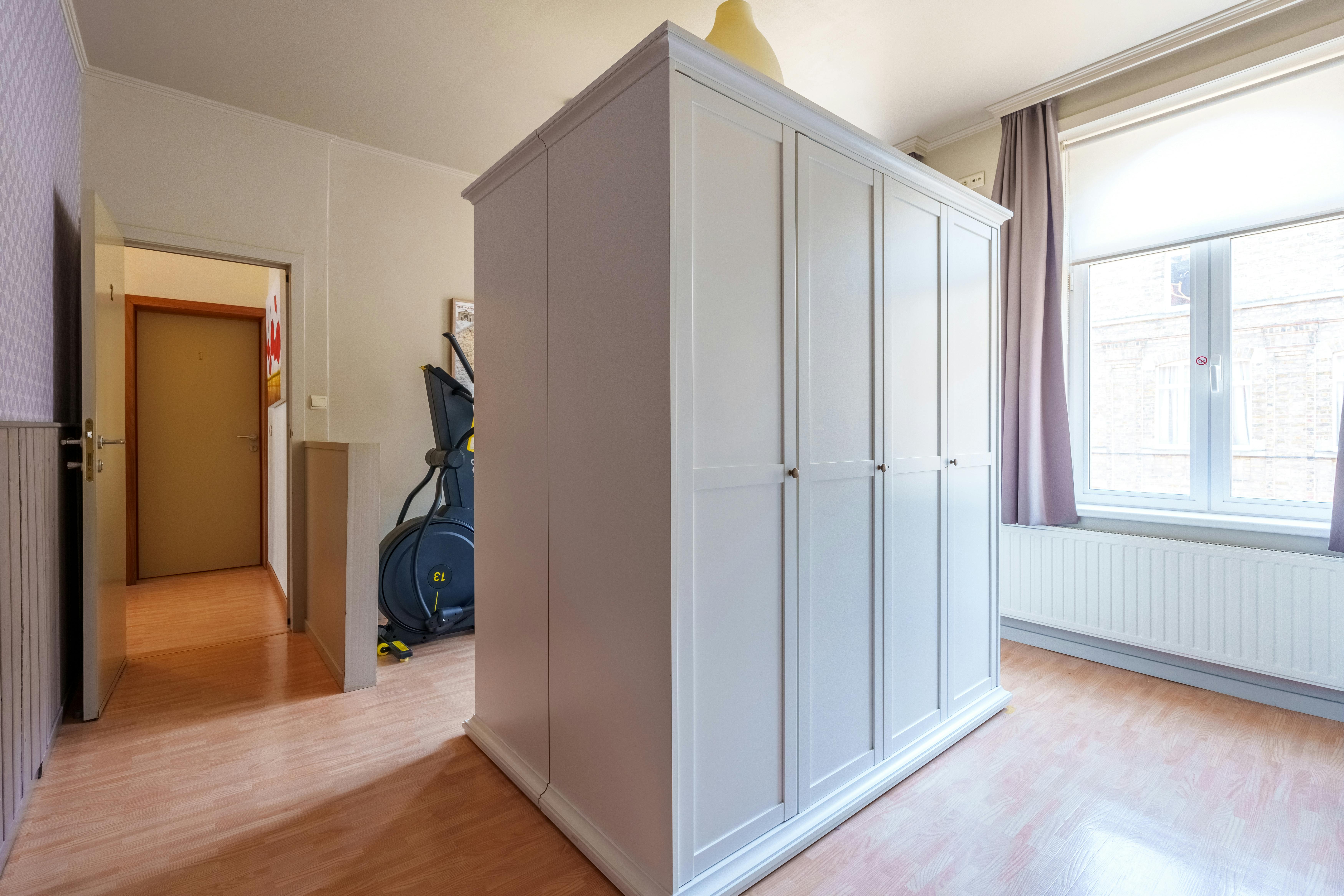 Uniek herenhuis in hartje Ieper met 8 slaapkamers en 7 badkamers  foto 21