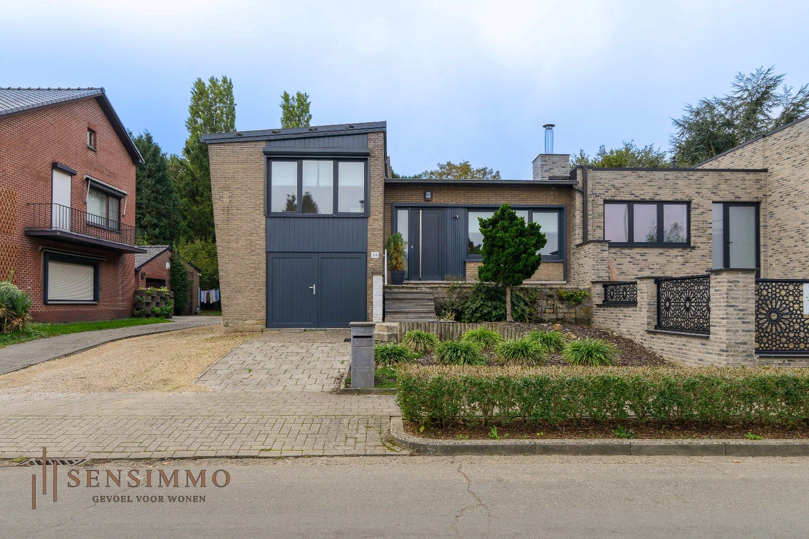 Gerennoveerde halfopen bebouwing met 3 slaakamers, terras, tuin en dubbele garage foto 24