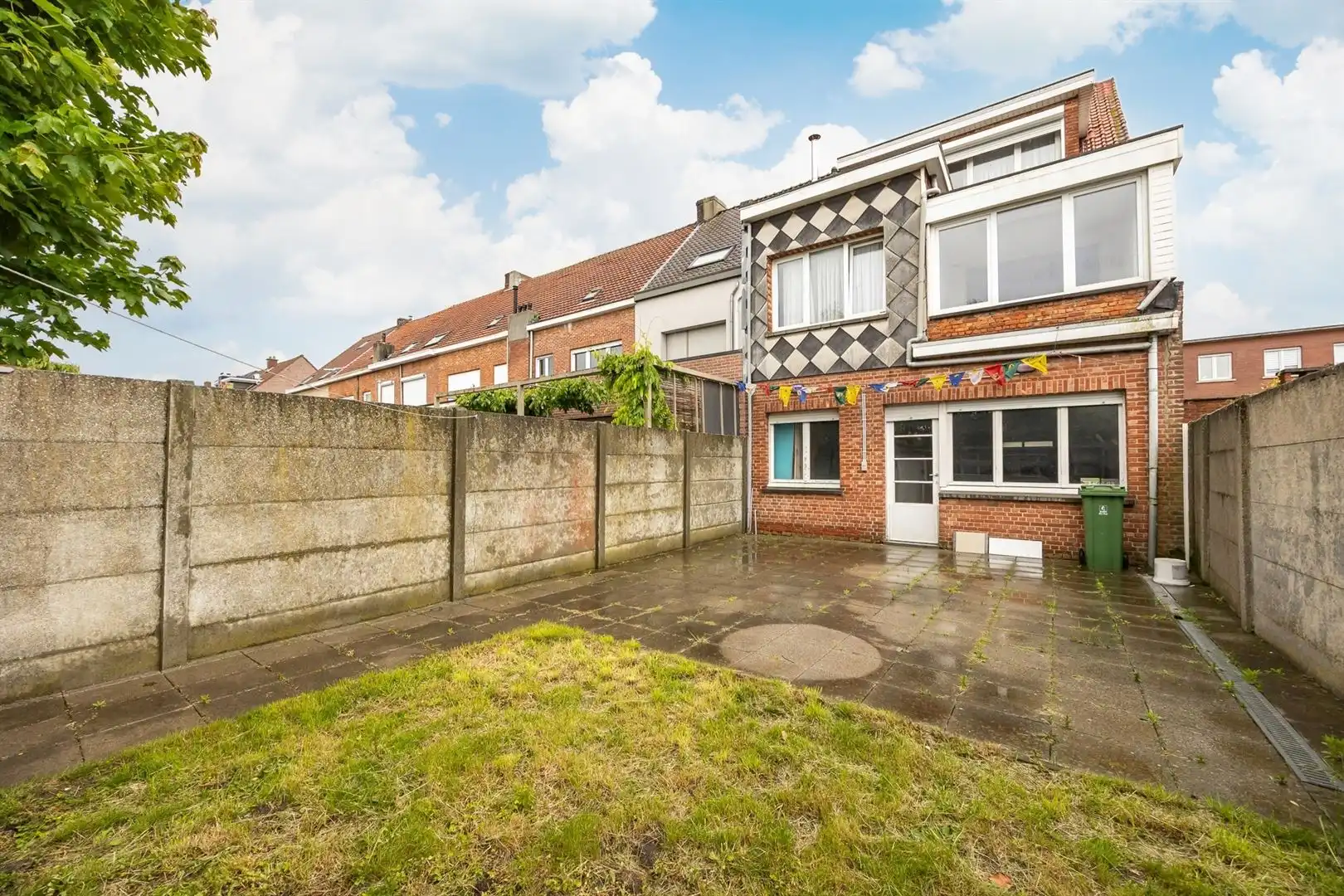 Ruime gezinswoning met zonnige tuin en renovatiepotentieel foto 30