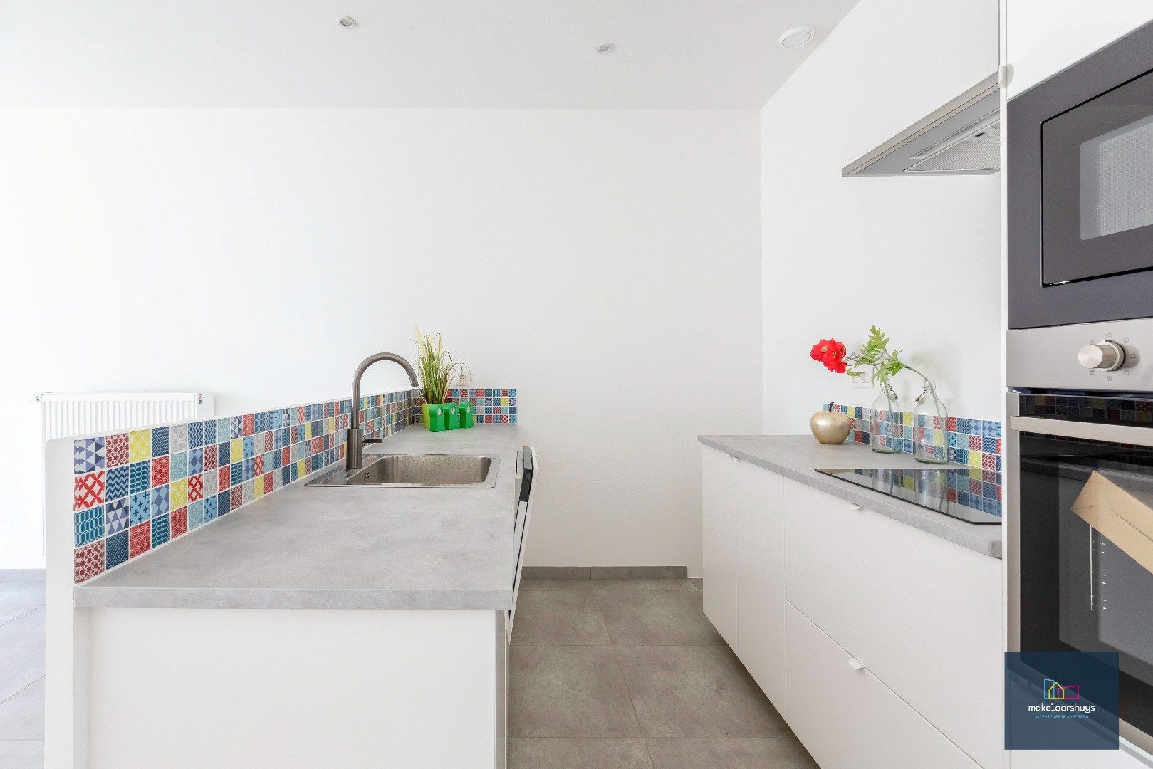 Instapklare energiezuinige woning met 3slpk tuin en staanplaats foto 2