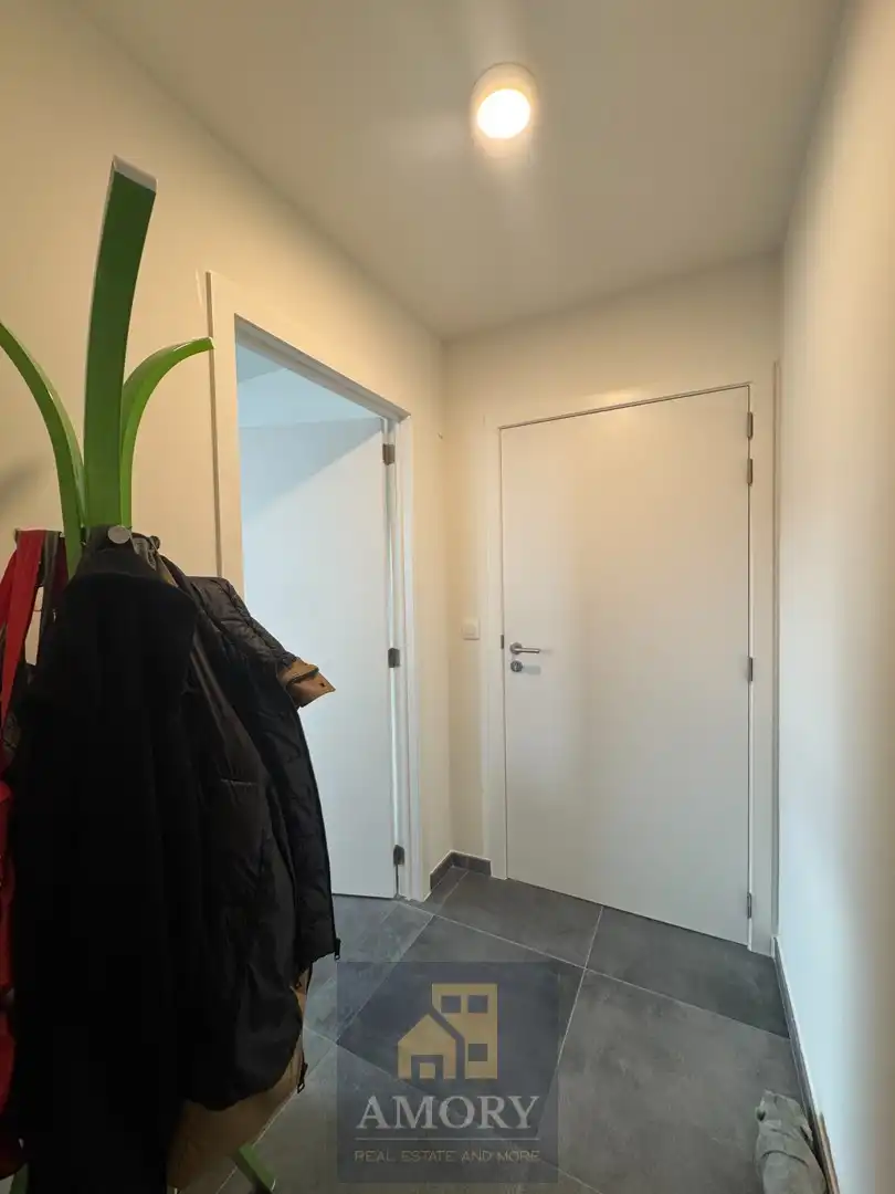 Zonovergoten penthouse met 2 grote terrassen aan Kerkplein te Beveren-Leie foto 3