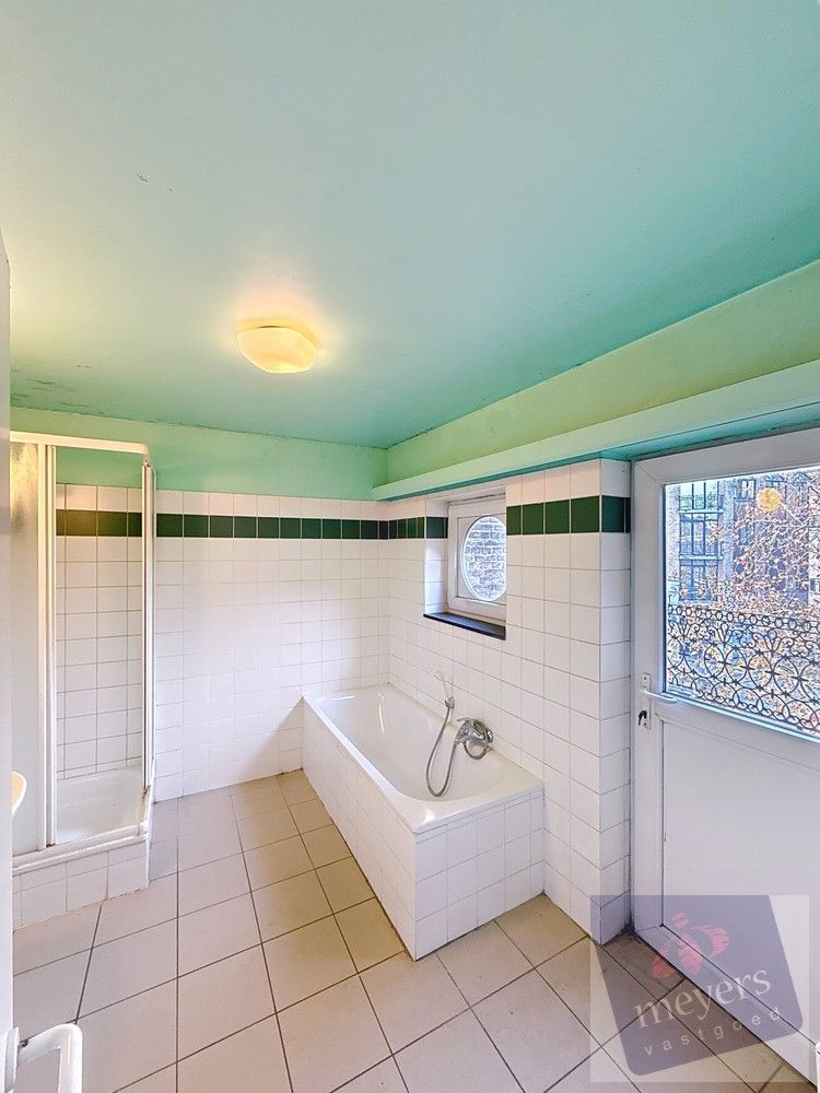 Ruim duplexappartement met 3 slaapkamers op topligging in Hasselt foto 12