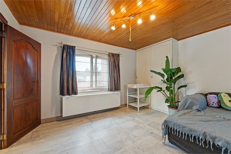 CHARMANTE GEZINSWONING OP EEN RUIM PERCEEL IN BUVINGEN foto 12