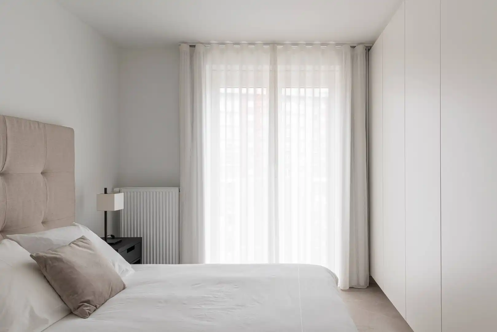 Lichtrijk recent instapklaar appartement met 2 slaapkamers, zonneterras, parking en ruime kelderberging foto 13