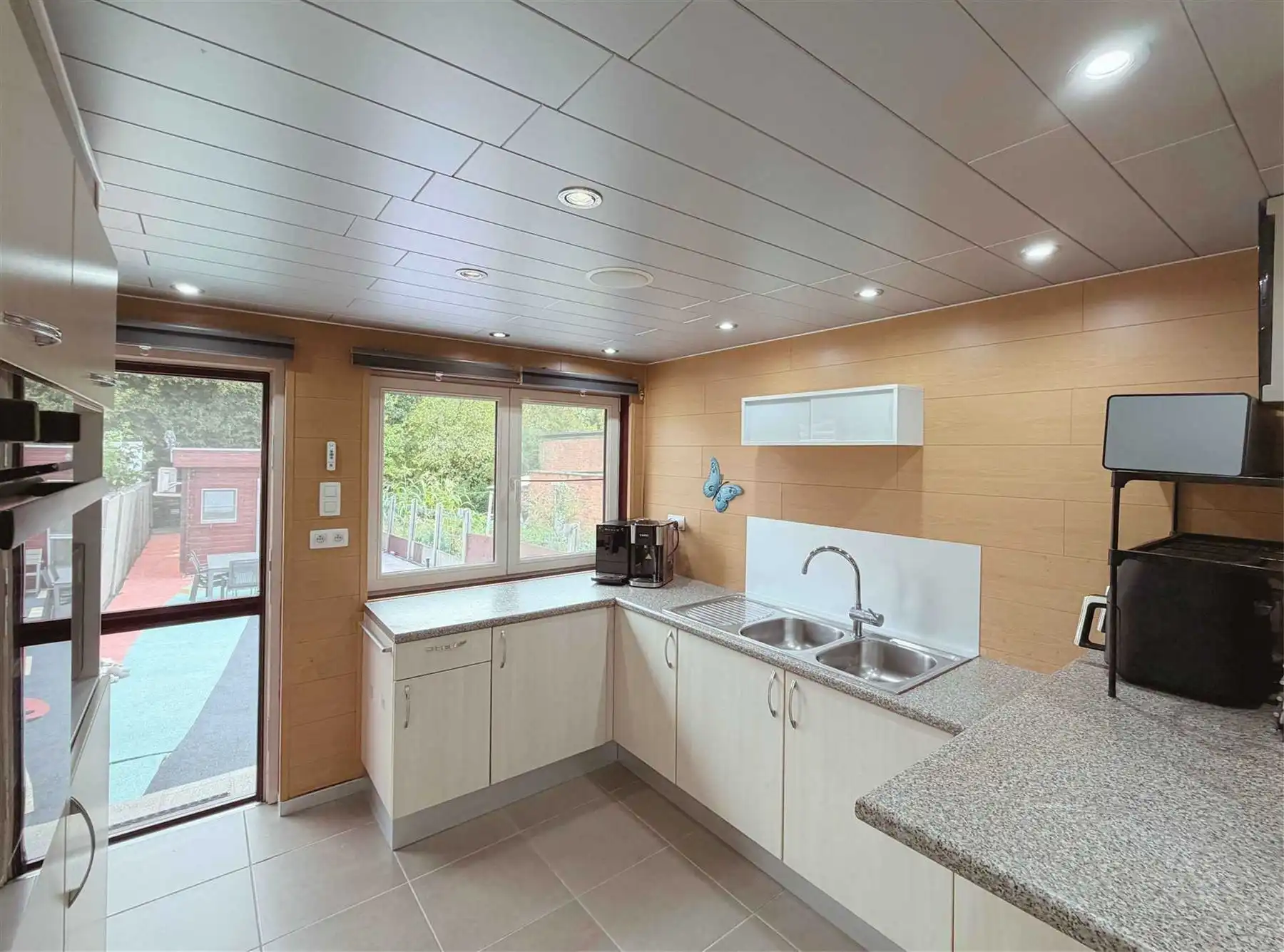 Ruime rijwoning met 3 slk's, tuin en polyvalent bijgebouw. foto 6