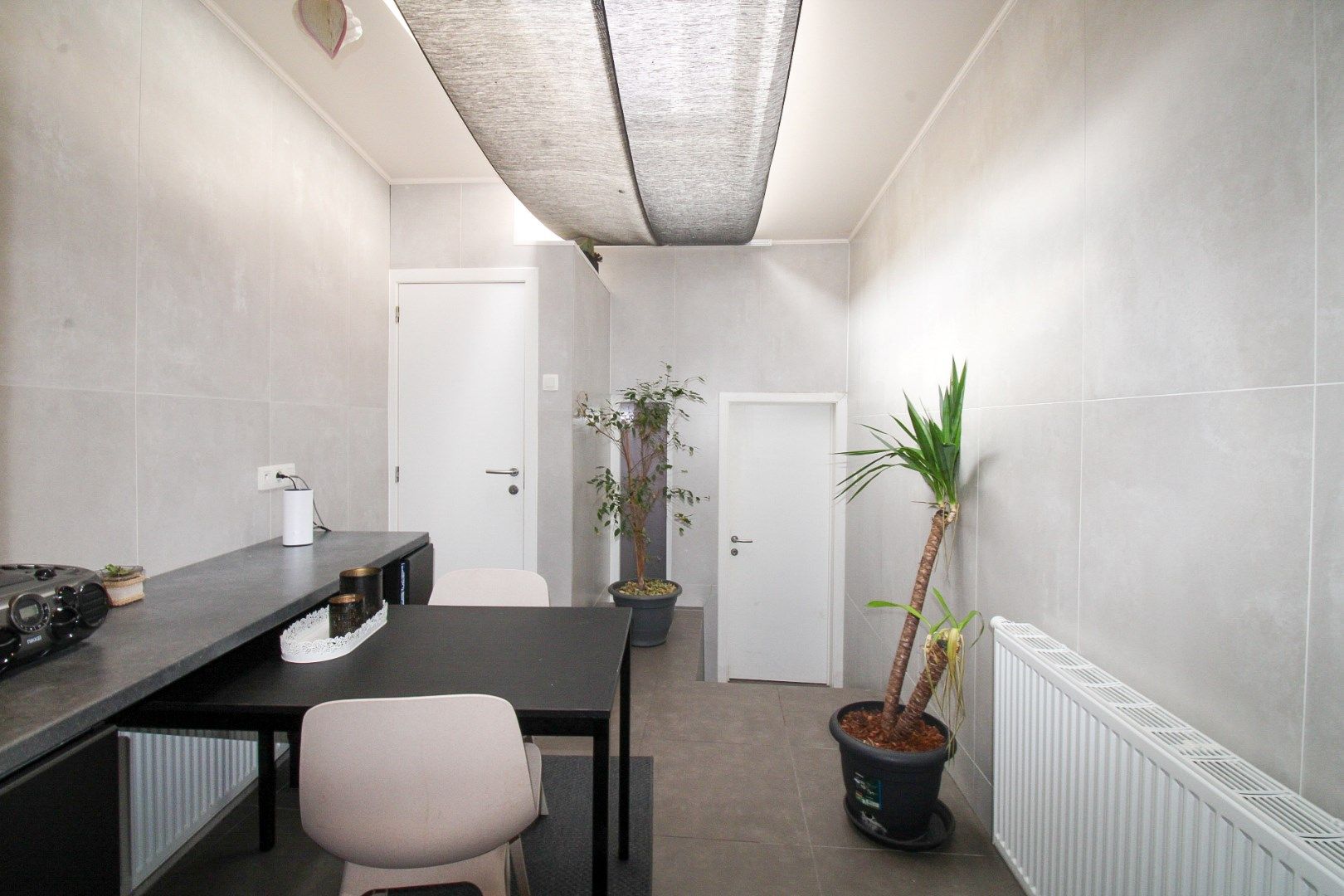 Veelzijdig handelshuis met woonst en luxueuze B&B op toplocatie aan de Markt van Temse! foto 19