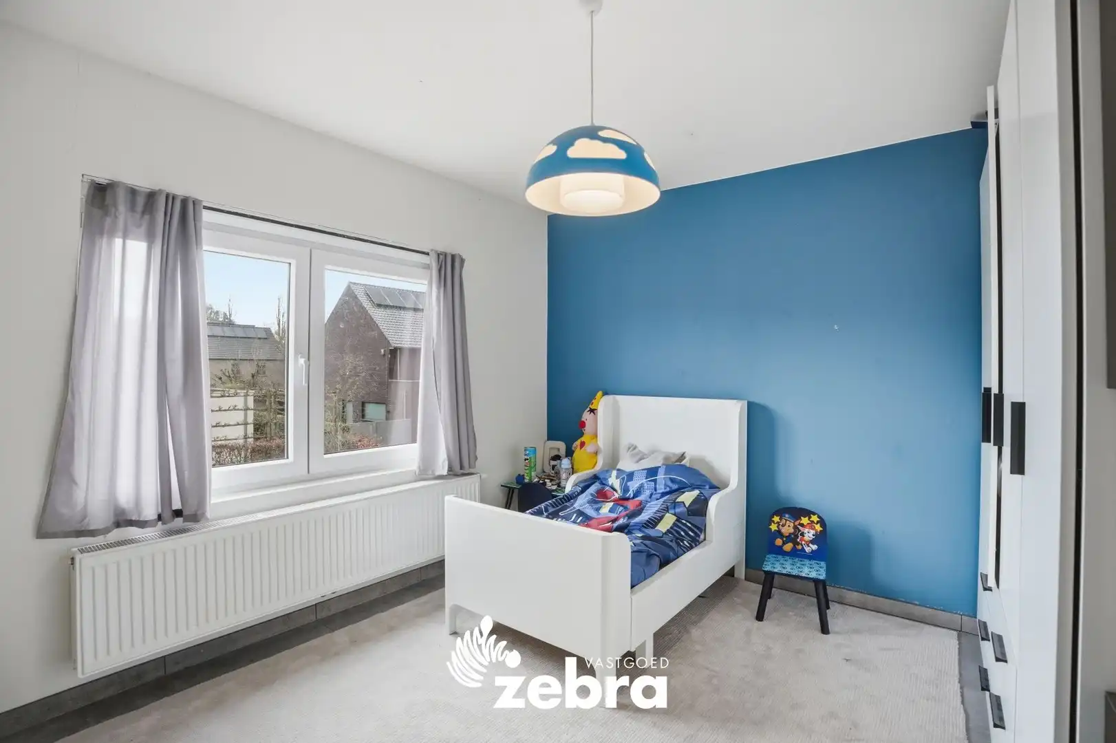 Gerenoveerde rijwoning met uitweg te Roeselare! foto 7