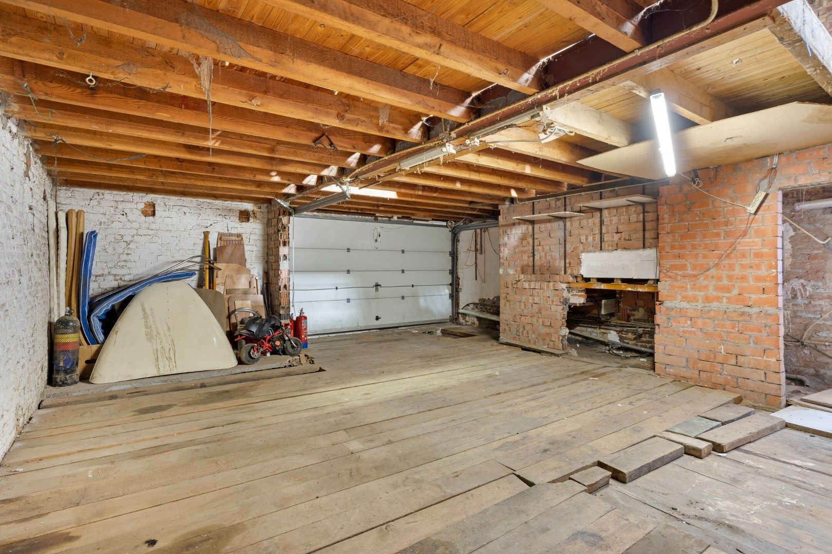 Halfopen hoekwoning met garage en dakterras op toplocatie in Kessel-Lo – renovatieproject met veel potentieel foto 16